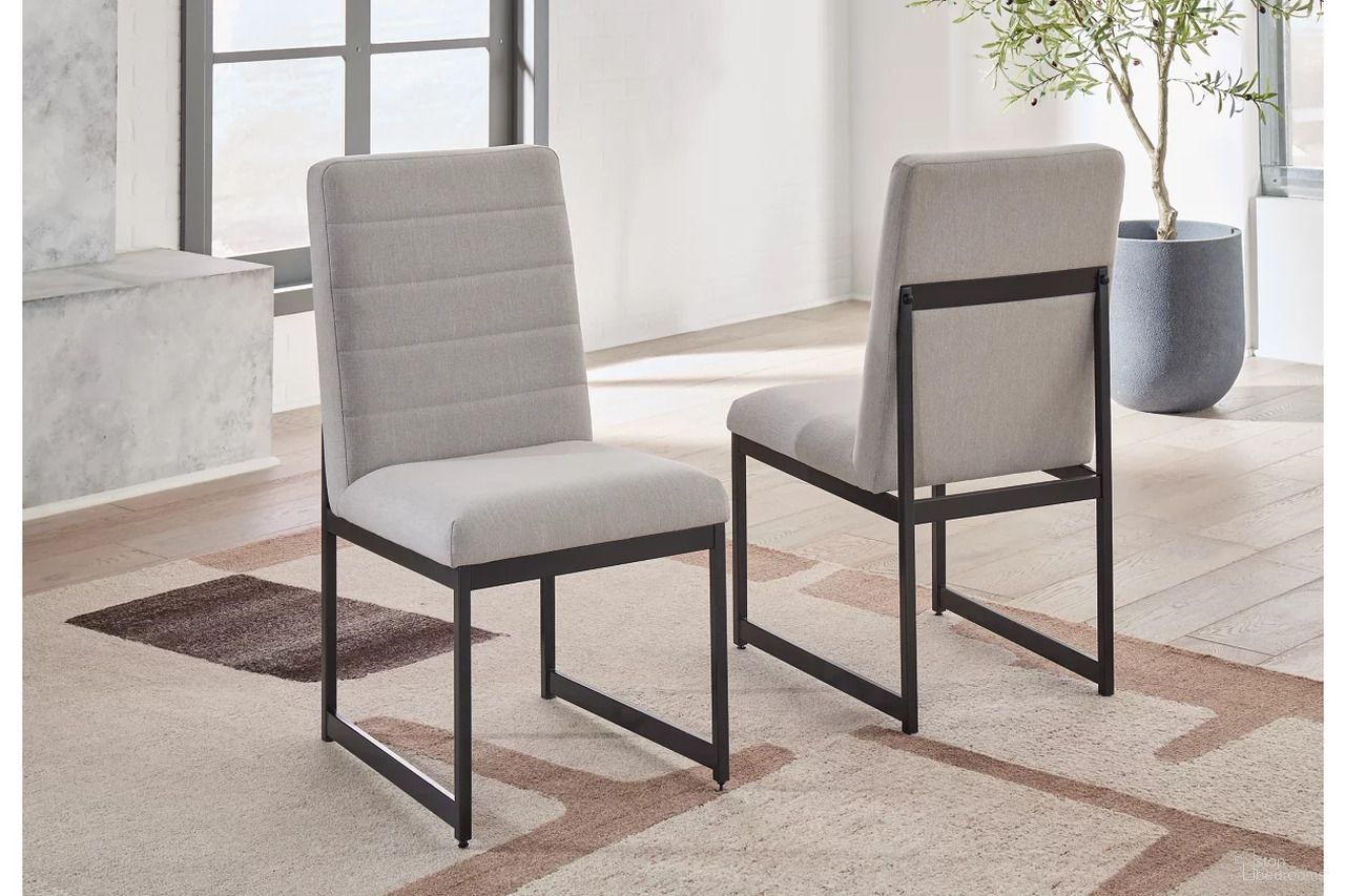 The appearance of Tomtyn Dining Chair Set of 2 In Light Brown designed by Signature Design by Ashley in the transitional interior design. This light brown piece of furniture  was selected by 1StopBedrooms from Tomtyn Collection to add a touch of cosiness and style into your home. Sku: D622-01. Material: Wood. Chair Type: Side Chair.