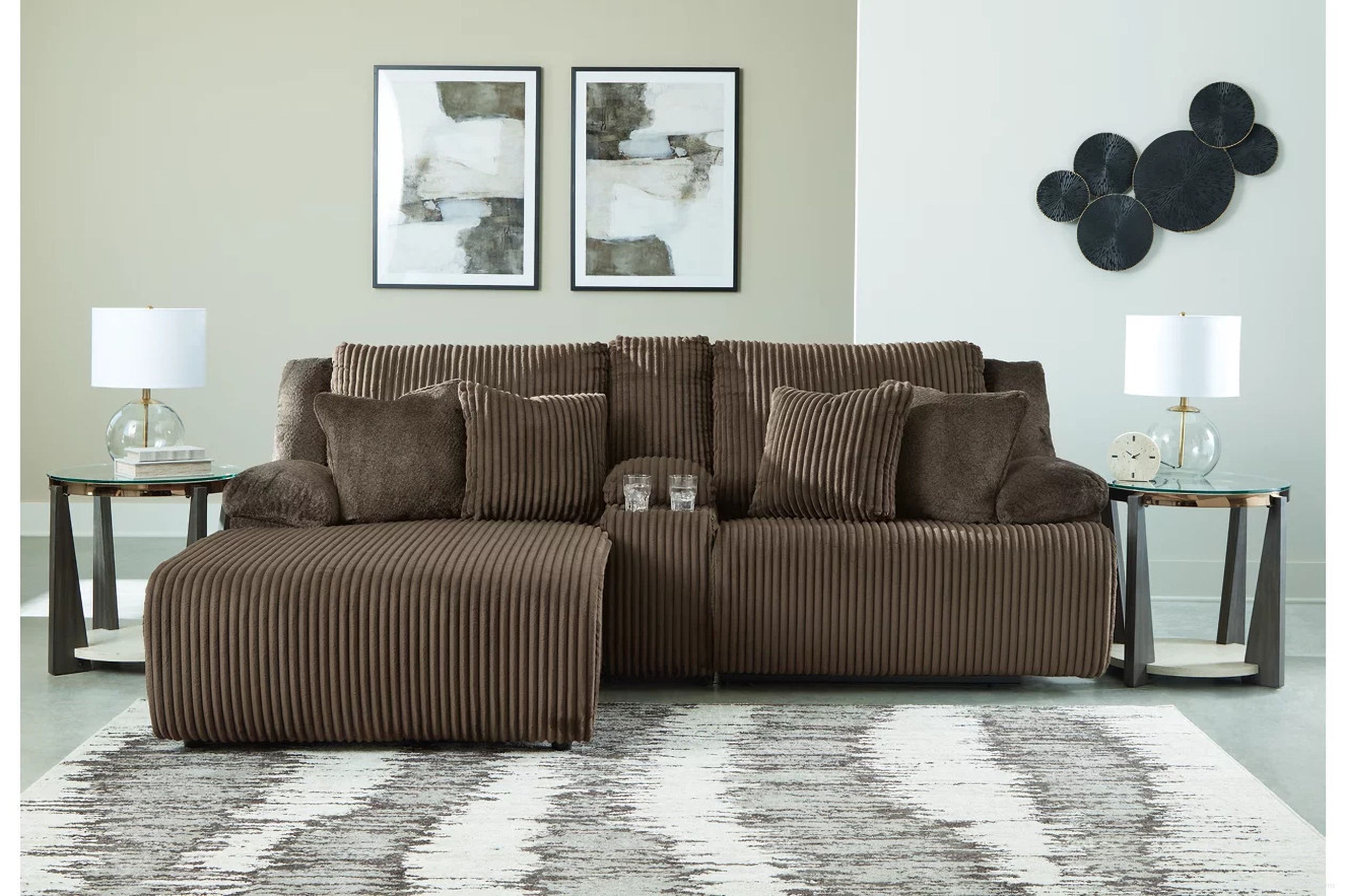 The appearance of Top Tier 3-Piece Reclining Sectional Sofa with Chaise In Chocolate designed by Signature Design by Ashley in the modern / contemporary interior design. This chocolate piece of furniture  was selected by 1StopBedrooms from Top Tier Collection to add a touch of cosiness and style into your home. Sku: 9270505;9270557;9270541. Material: Polyester. Layout: L-Shape. Orientation: LAF.