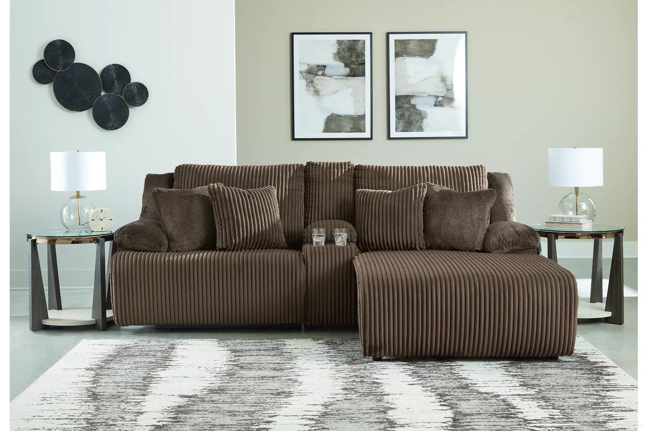The appearance of Top Tier 3-Piece Reclining Sectional Sofa with Chaise In Chocolate designed by Signature Design by Ashley in the modern / contemporary interior design. This chocolate piece of furniture was selected by 1StopBedrooms from Top Tier Collection to add a touch of cosiness and style into your home. Sku: 9270540;9270557;9270507. Material: Polyester. Layout: L-Shape. Orientation: RAF.