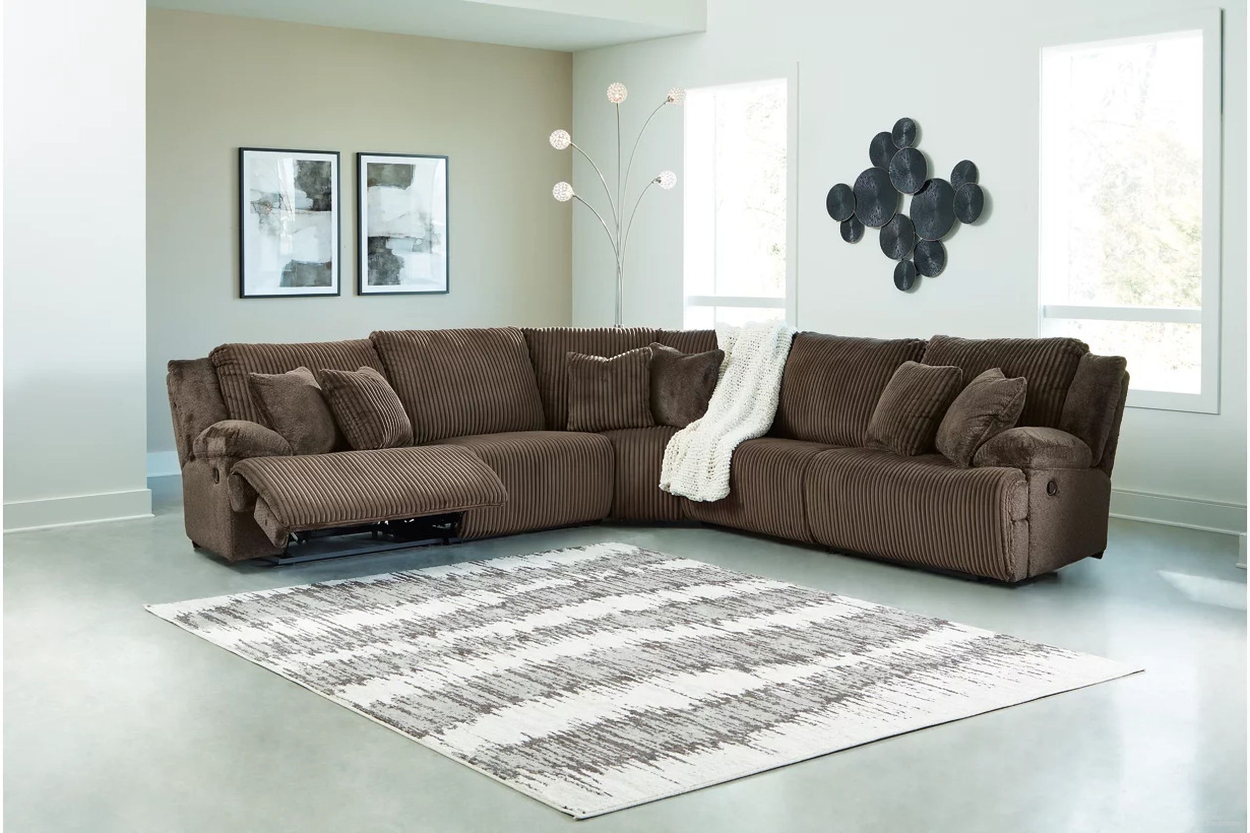 The appearance of Top Tier 5-Piece Reclining Sectional In Chocolate designed by Signature Design by Ashley in the modern / contemporary interior design. This chocolate piece of furniture  was selected by 1StopBedrooms from Top Tier Collection to add a touch of cosiness and style into your home. Sku: 9270540;9270546;9270519;9270577;9270541. Material: Polyester. Layout: L-Shape.