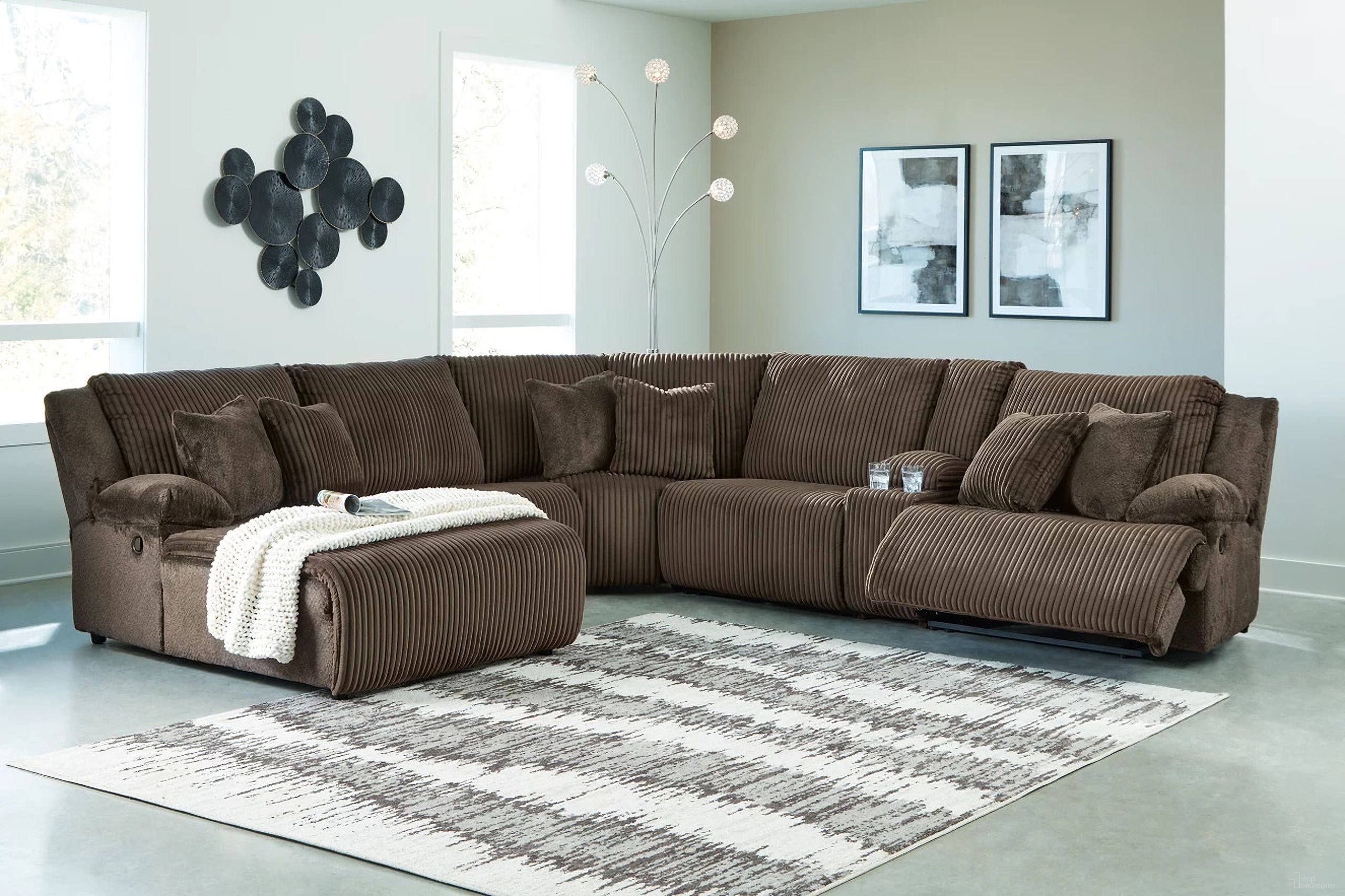 The appearance of Top Tier 6-Piece Reclining Sectional with Chaise In Chocolate designed by Signature Design by Ashley in the modern / contemporary interior design. This chocolate piece of furniture was selected by 1StopBedrooms from Top Tier Collection to add a touch of cosiness and style into your home. Sku: 9270505;9270519;9270546;9270557;9270577;9270541. Material: Polyester. Layout: U-Shape. Orientation: LAF.