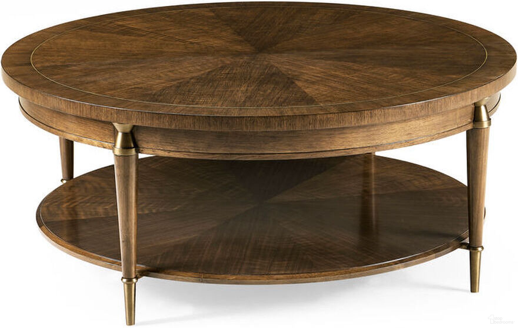 The appearance of Toulouse Round Cocktail Table In Walnut designed by Jonathan Charles in the transitional interior design. This walnut piece of furniture was selected by 1StopBedrooms from Toulouse Collection to add a touch of cosiness and style into your home. Sku: 500359-WTL. Material: Wood.