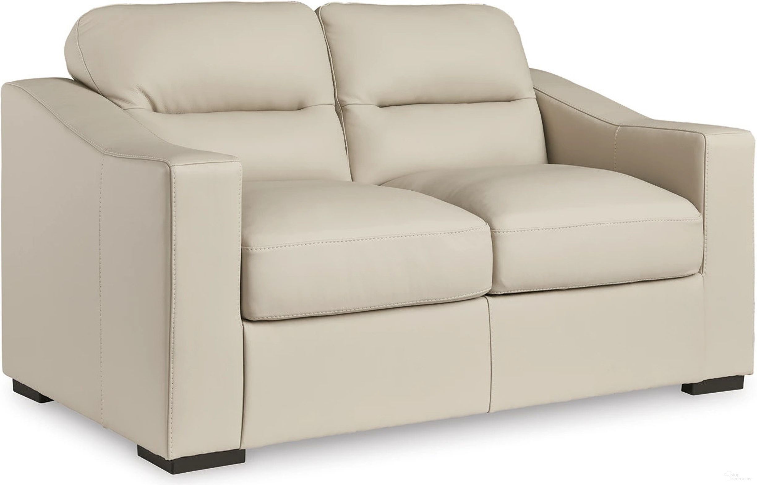 The appearance of Treasure Trove Loveseat In Almond designed by Signature Design by Ashley in the modern / contemporary interior design. This almond piece of furniture was selected by 1StopBedrooms from Treasure Trove Collection to add a touch of cosiness and style into your home. Sku: 1930435. Material: Genuine Leather.