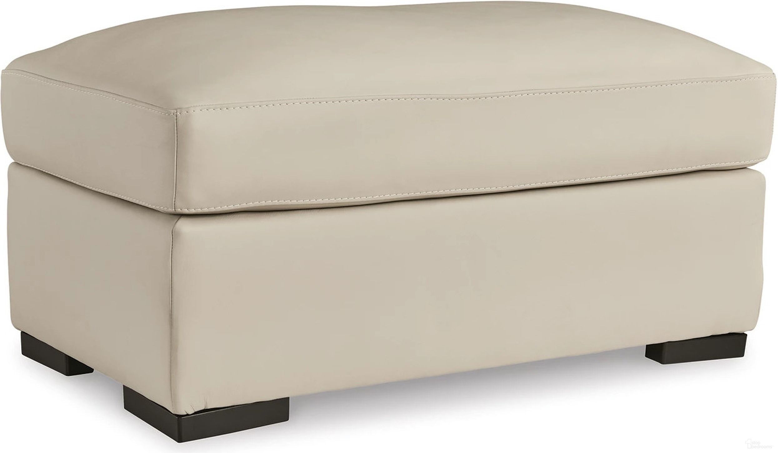 The appearance of Treasure Trove Ottoman In Almond designed by Signature Design by Ashley in the modern / contemporary interior design. This almond piece of furniture was selected by 1StopBedrooms from Treasure Trove Collection to add a touch of cosiness and style into your home. Sku: 1930414. Material: Faux Leather.