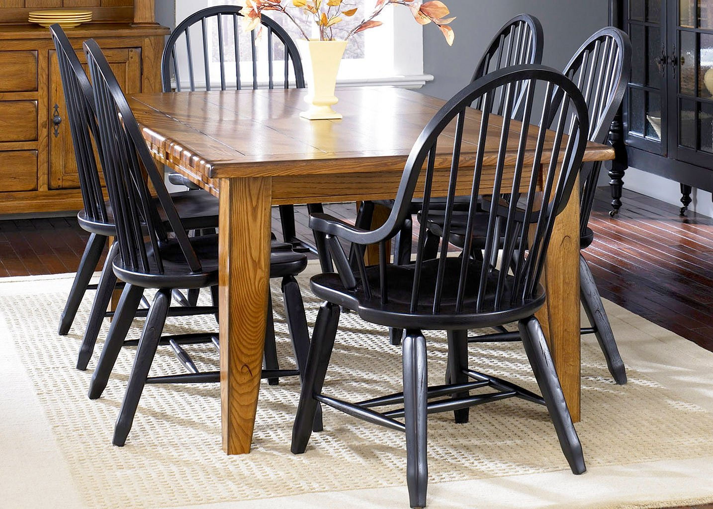 The appearance of Treasures Dining Room Set w/ Black Chairs designed by Liberty in the traditional interior design. This rustic oak and black piece of furniture  was selected by 1StopBedrooms from Treasures Collection to add a touch of cosiness and style into your home. Sku: 17-T4408;17-C4050. Table Base Style: Legs. Material: Wood. Table Top Shape: Rectangular. Size: 108" x 44".