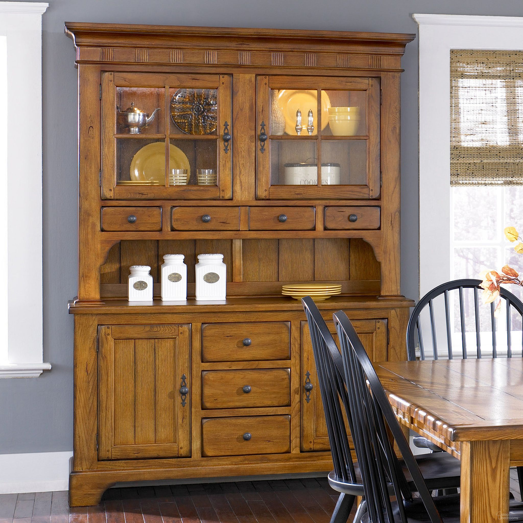 The appearance of Treasures Oak Buffet With Hutch designed by Liberty in the traditional interior design. This brown piece of furniture  was selected by 1StopBedrooms from Treasures Collection to add a touch of cosiness and style into your home. Sku: 17-CB6285;17-CH6285. Material: Wood.