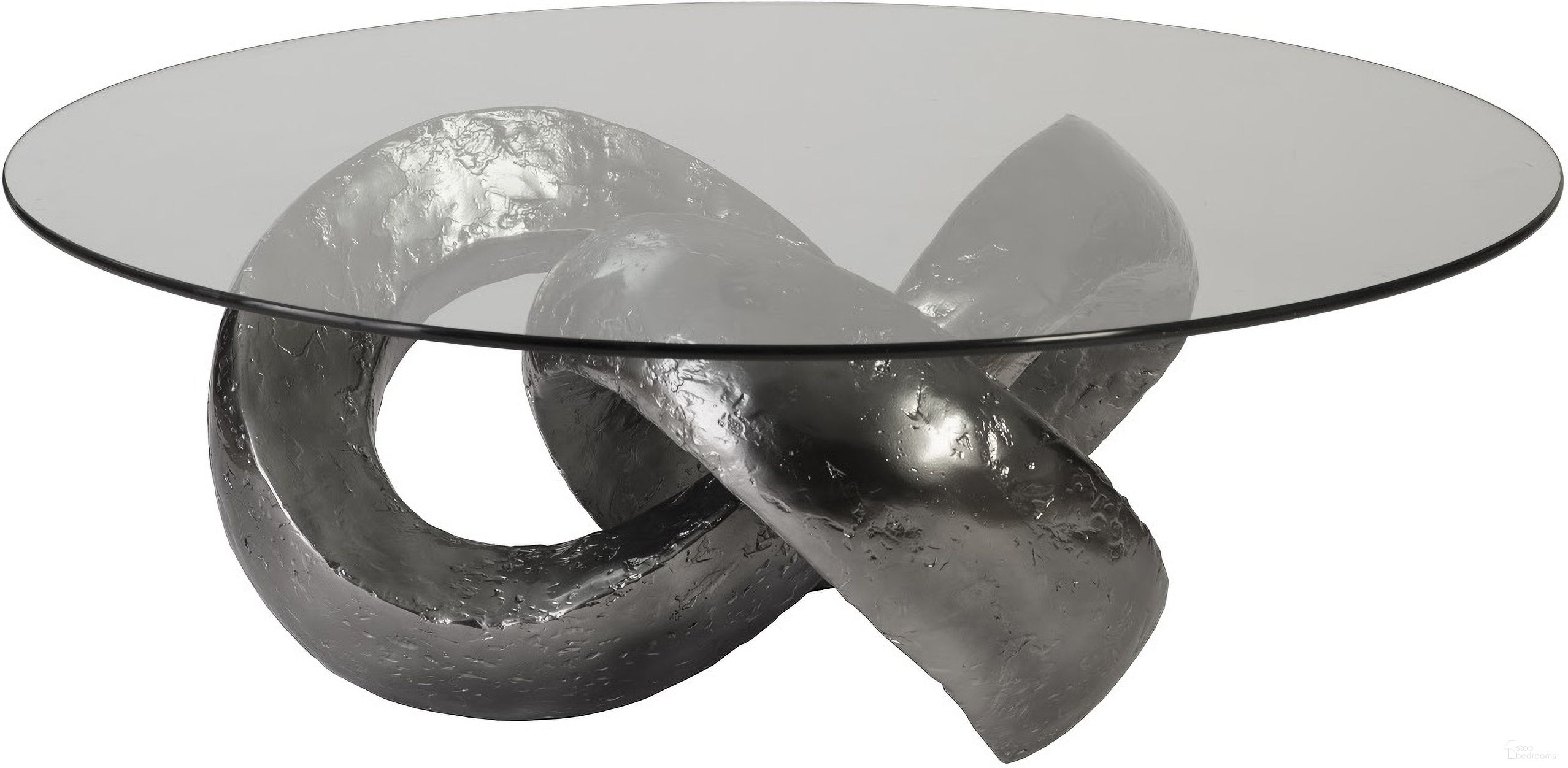 The appearance of Trifoil Coffee Table In Silver designed by Phillips Collection in the modern / contemporary interior design. This silver piece of furniture  was selected by 1StopBedrooms from Outdoor Collection to add a touch of cosiness and style into your home. Sku: PH80677. Material: Resin.