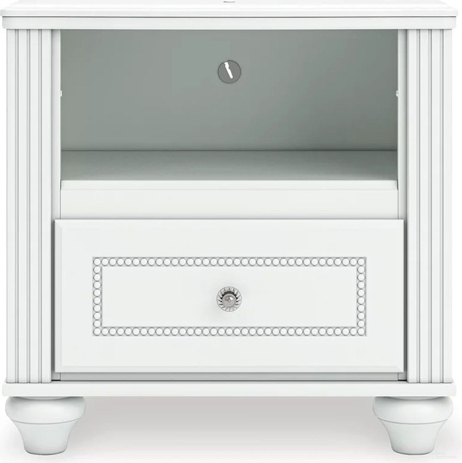 The appearance of Trindura Nightstand In White designed by Signature Design by Ashley in the traditional interior design. This white piece of furniture was selected by 1StopBedrooms from Trindura Collection to add a touch of cosiness and style into your home. Sku: NCB1819-91. Material: Wood.