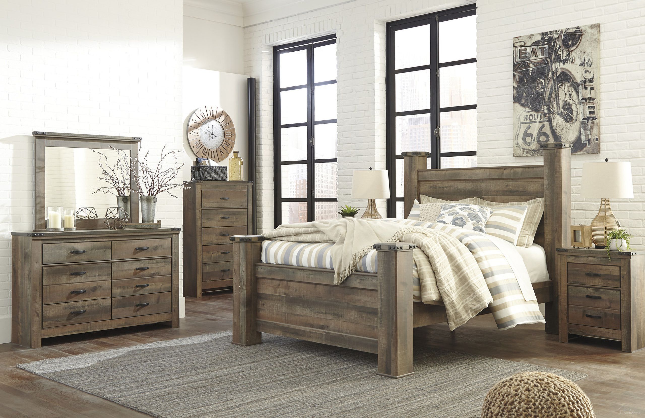 The appearance of Trinell Brown Poster Bedroom Set designed by Signature Design by Ashley in the transitional interior design. This brown piece of furniture  was selected by 1StopBedrooms from Trinell Collection to add a touch of cosiness and style into your home. Sku: B446-67;B446-61;B446-64;B446-98;B446-91. Bed Type: Poster Bed. Material: Wood. Bed Size: Queen.