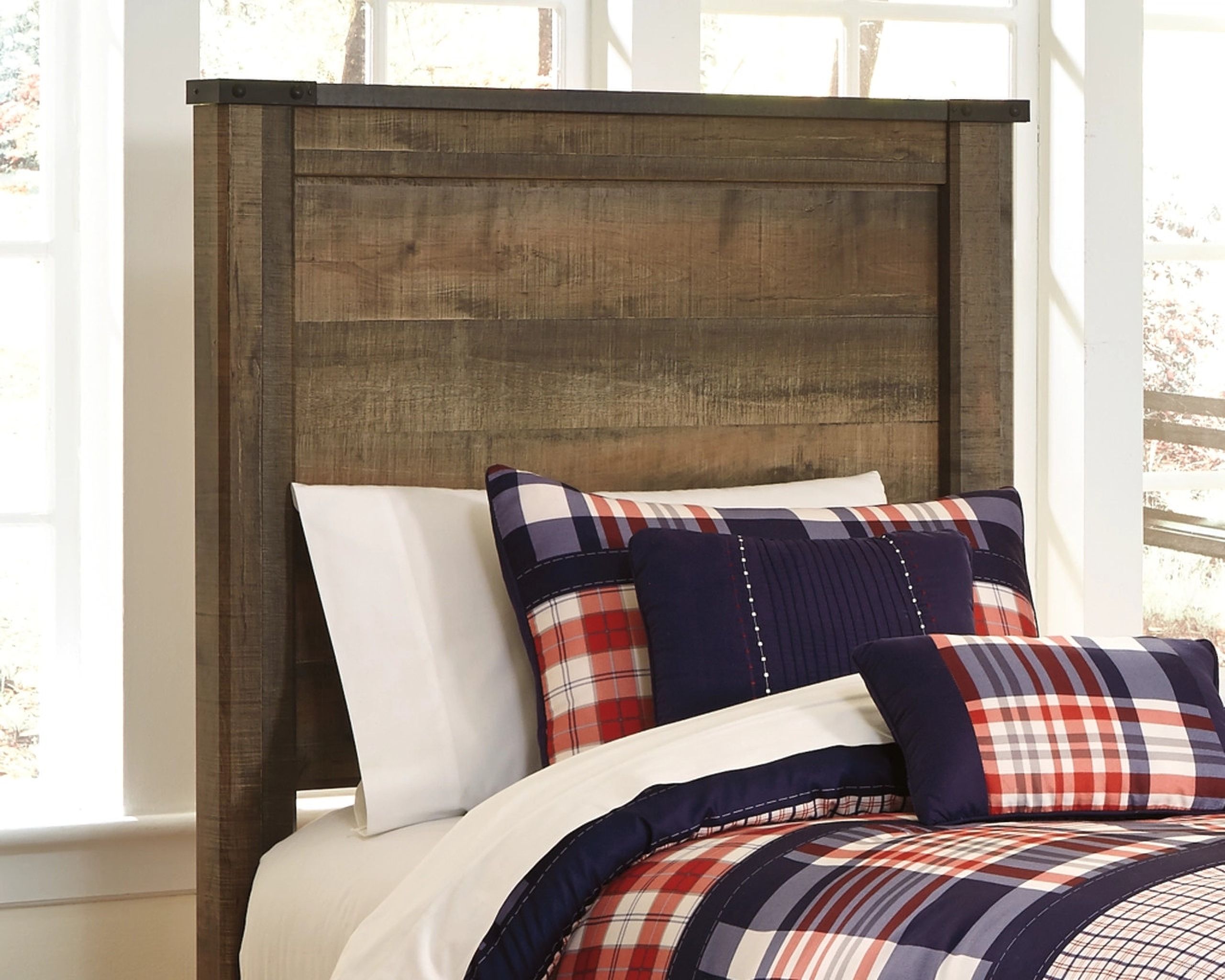 The appearance of Trinell Brown Twin Panel Headboard Only designed by Signature Design by Ashley in the transitional interior design. This brown piece of furniture was selected by 1StopBedrooms from Trinell Collection to add a touch of cosiness and style into your home. Sku: B446-53. Material: Wood. Bed Size: Twin.
