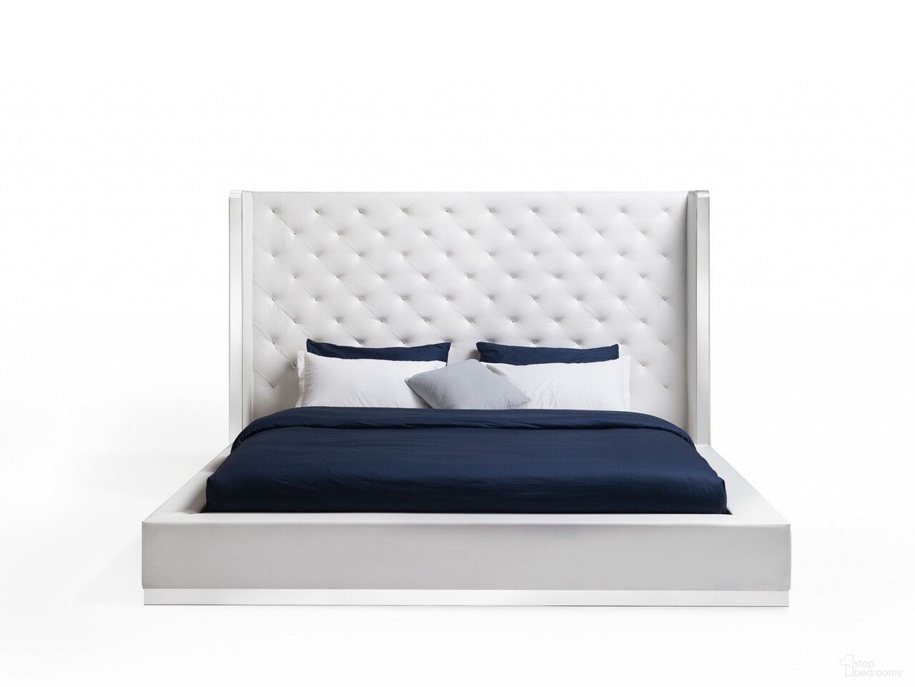 The appearance of Tufted Faux Leather King Bed Frame In White designed by Homeroots in the modern / contemporary interior design. This white piece of furniture  was selected by 1StopBedrooms from  to add a touch of cosiness and style into your home. Sku: 374144. Material: Faux Leather. Bed Size: King.