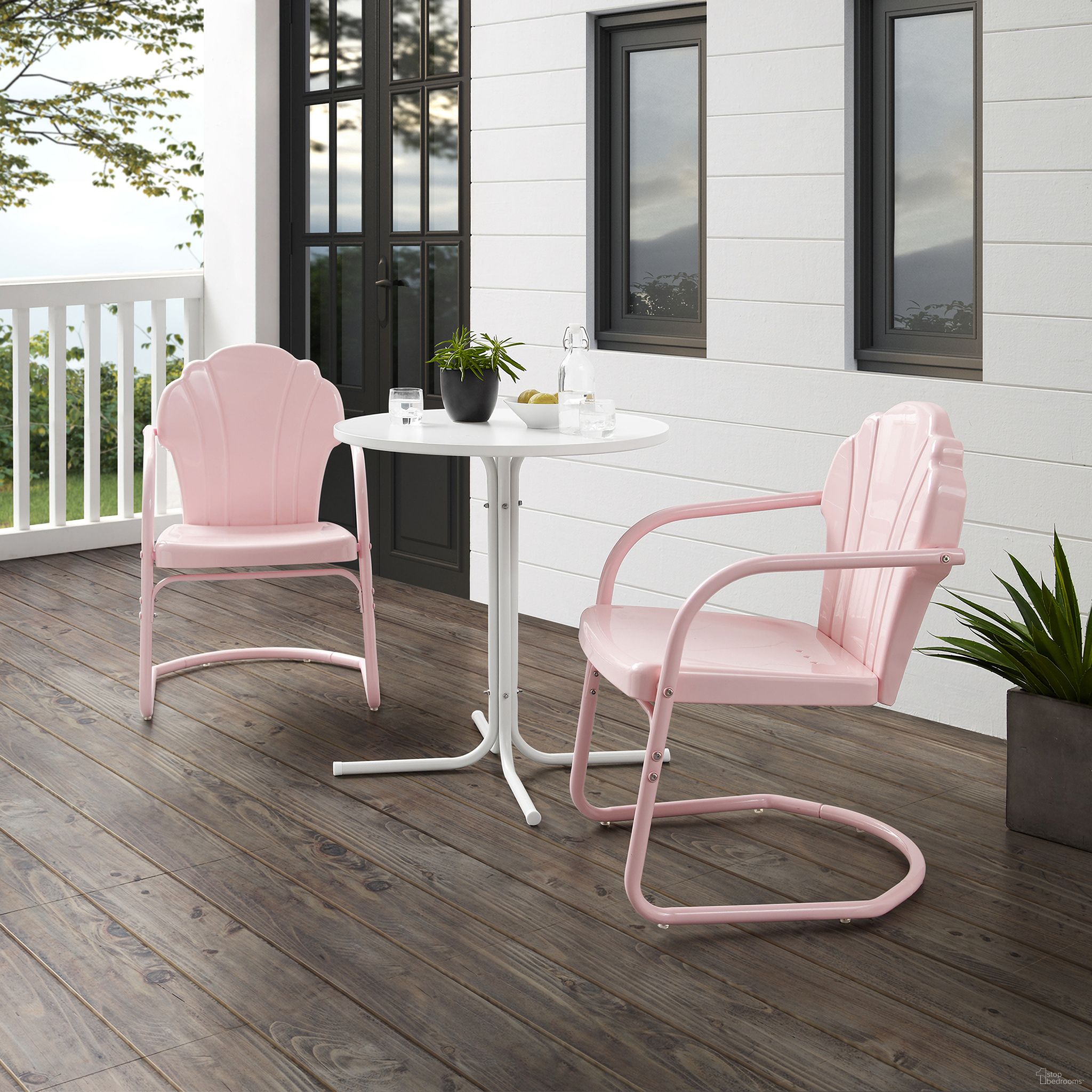 The appearance of Tulip 3 Piece Retro Outdoor Bistro Set In Pastel Pink Gloss and White Satin designed by Crosley Brands in the transitional interior design. This pink piece of furniture  was selected by 1StopBedrooms from Tulip Collection to add a touch of cosiness and style into your home. Sku: CO1029-PI;CO1014-WH. Material: Steel.