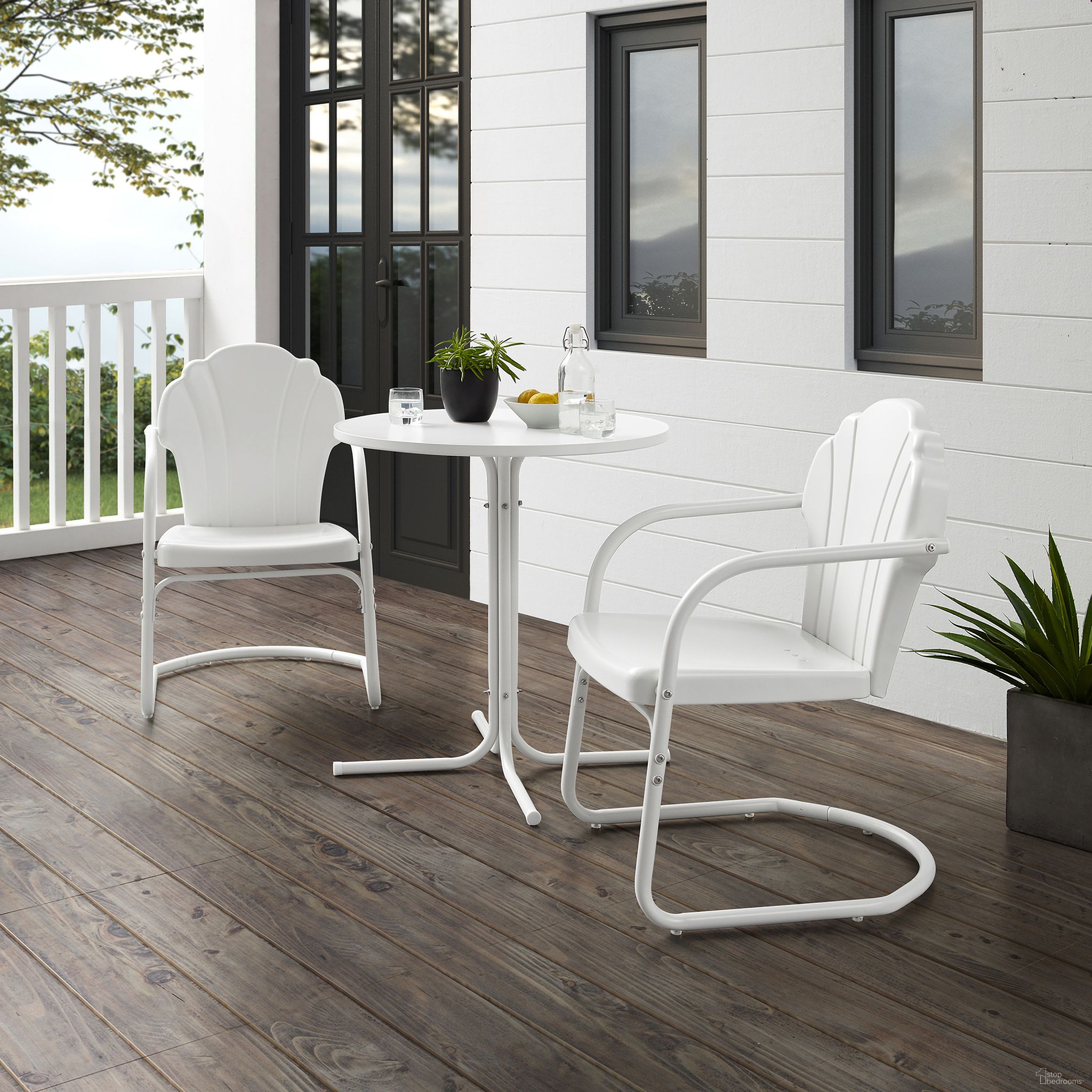 The appearance of Tulip 3 Piece Retro Outdoor Bistro Set In White Satin designed by Crosley Brands in the transitional interior design. This white piece of furniture was selected by 1StopBedrooms from Tulip Collection to add a touch of cosiness and style into your home. Sku: CO1029-WH;CO1014-WH. Material: Steel.