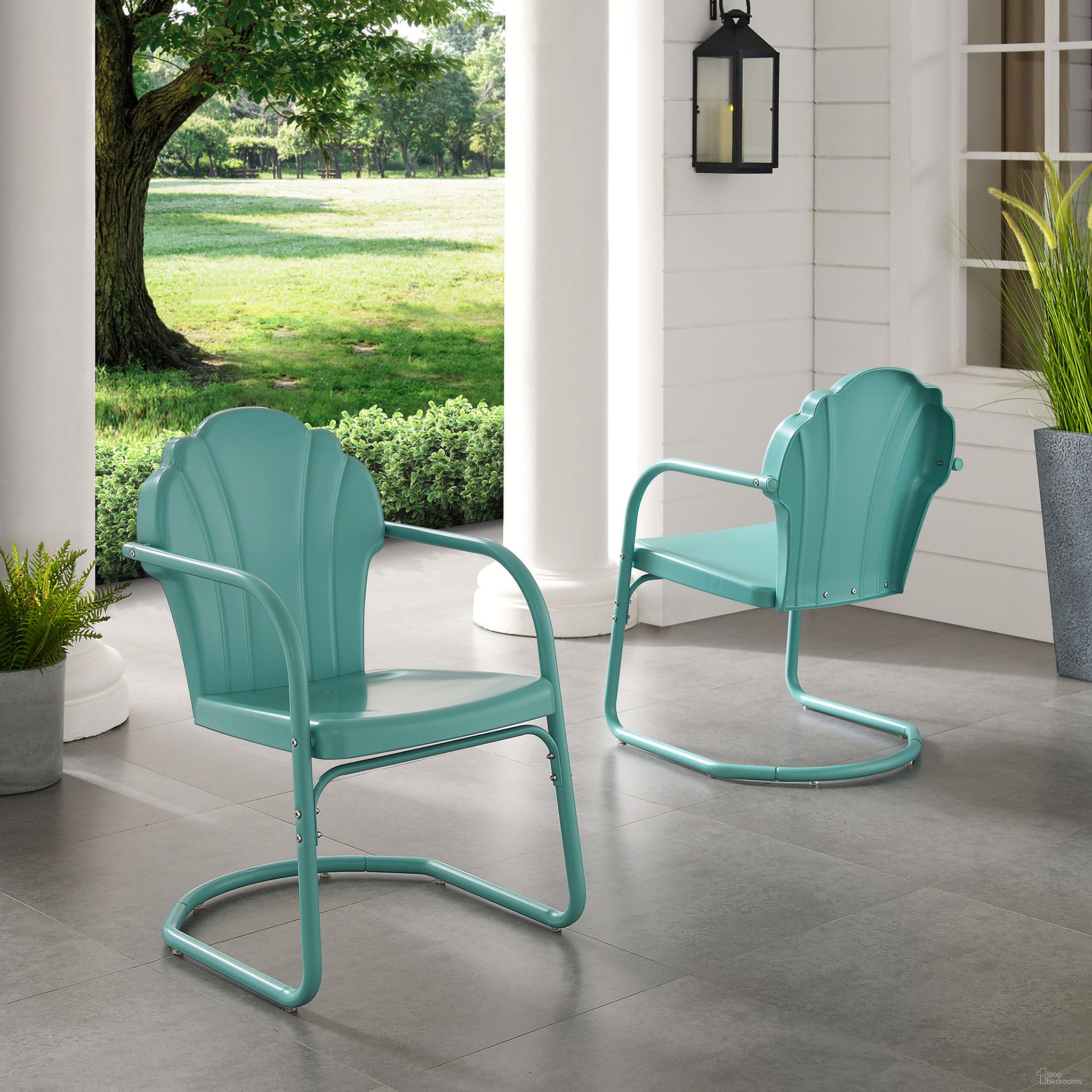 The appearance of Tulip Retro Outdoor Chair In Pastel Blue Satin - Set of 2 designed by Crosley Brands in the transitional interior design. This blue piece of furniture was selected by 1StopBedrooms from Tulip Collection to add a touch of cosiness and style into your home. Sku: CO1029-BL. Material: Steel.