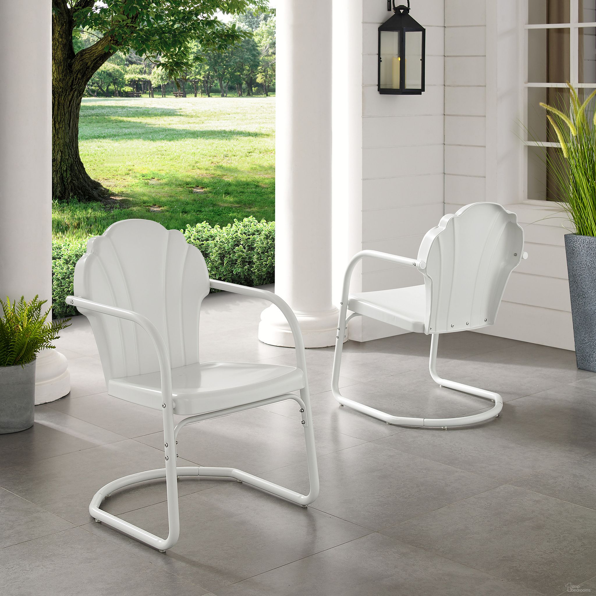 The appearance of Tulip Retro Outdoor Chair In White Satin - Set of 2 designed by Crosley Brands in the transitional interior design. This white piece of furniture was selected by 1StopBedrooms from Tulip Collection to add a touch of cosiness and style into your home. Sku: CO1029-WH. Material: Steel.