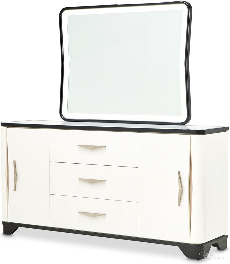 The appearance of Tuxedo Sideboard and Mirror In Piano Keyboard designed by Michael Amini in the modern / contemporary interior design. This black piece of furniture was selected by 1StopBedrooms from Tuxedo Collection to add a touch of cosiness and style into your home. Sku: 9087007SA-832;9087260-832. Material: Poplar.