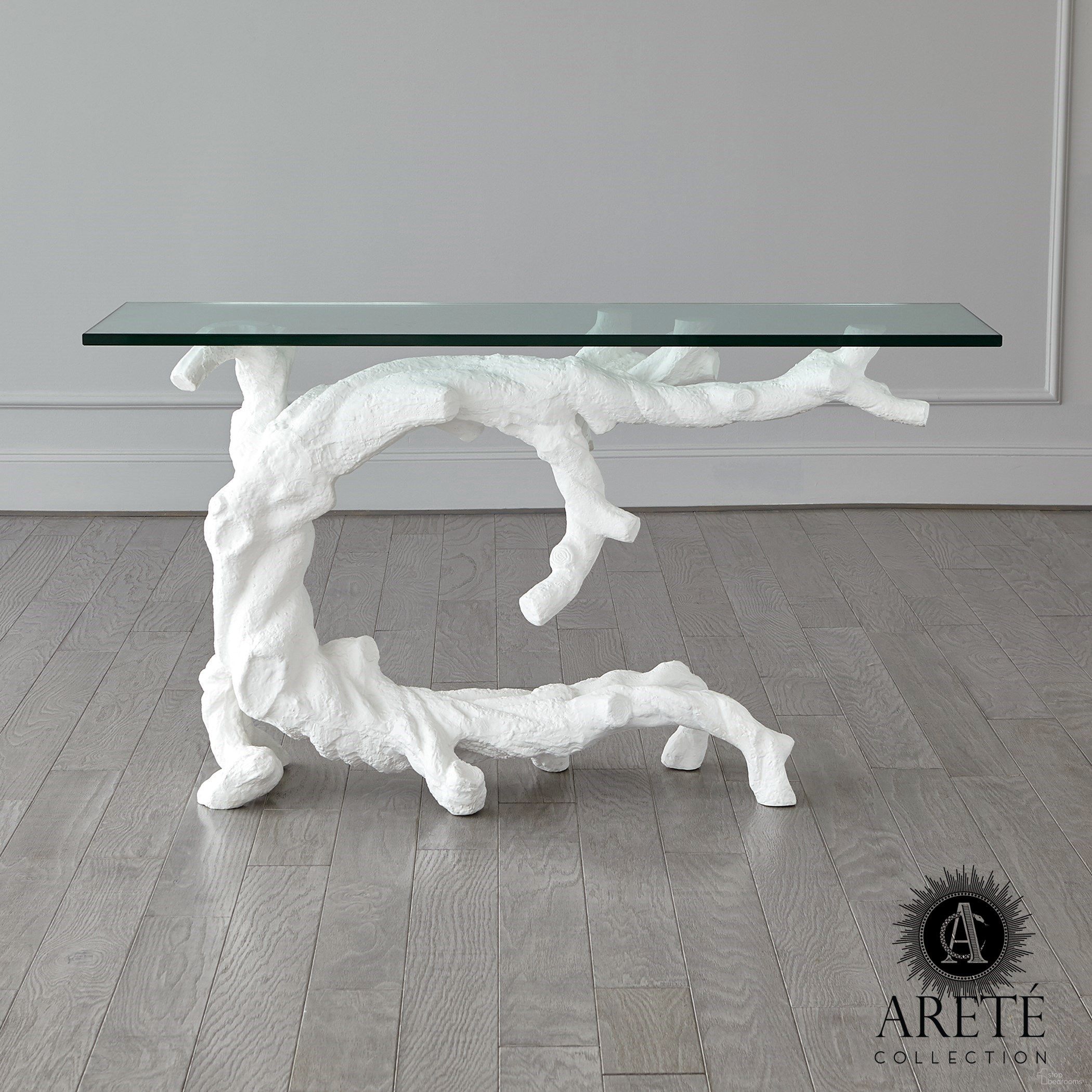 The appearance of Twisted Juniper Console In White designed by Global Views in the modern / contemporary interior design. This white piece of furniture was selected by 1StopBedrooms from Twisted Collection to add a touch of cosiness and style into your home. Sku: AC990012. Material: Aluminum.