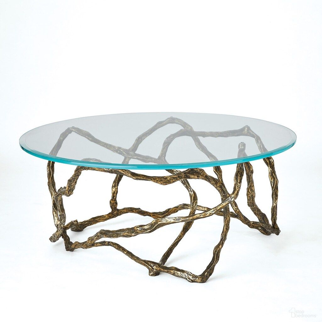 The appearance of Twistwood Cocktail Table In Antique Brass designed by Global Views in the modern / contemporary interior design. This antique brass piece of furniture was selected by 1StopBedrooms from Twistwood Collection to add a touch of cosiness and style into your home. Sku: 780761. Material: Brass.