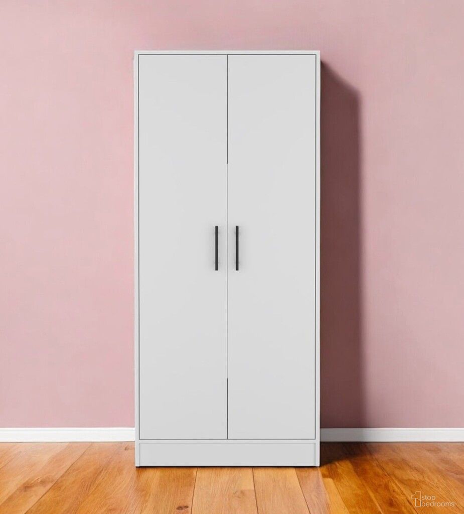The appearance of Modern 2-Piece Armoire and Nightstand Furniture Set In White designed by Homeroots in the modern / contemporary interior design. This white piece of furniture was selected by 1StopBedrooms from to add a touch of cosiness and style into your home. Sku: 530264. Material: Wood.