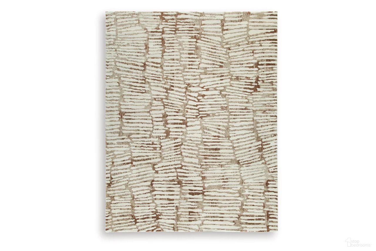 The appearance of Uduak Large Rug In Cream and Tan designed by Signature Design by Ashley in the modern / contemporary interior design. This cream/tan/rust piece of furniture was selected by 1StopBedrooms from Uduak Collection to add a touch of cosiness and style into your home. Sku: R408111. Material: Polypropylene.