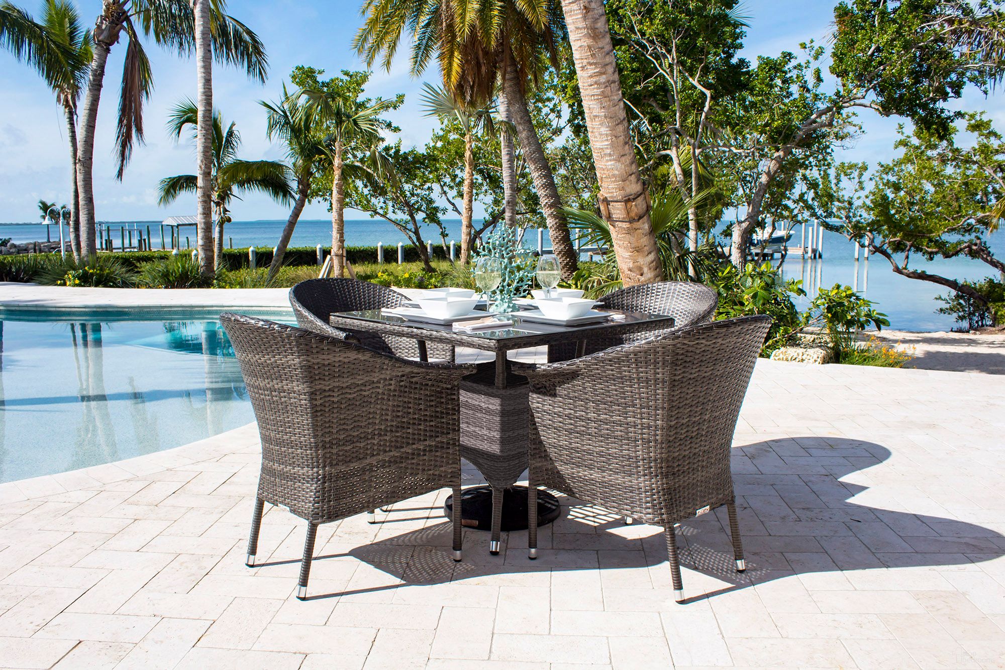 The appearance of Ultra 5-Piece Woven Armchair Dining Set with Cushions In Gray designed by Pelican Reef in the traditional interior design. This gray piece of furniture was selected by 1StopBedrooms from Ultra Collection to add a touch of cosiness and style into your home. Sku: 890-1130-GRY-5DA. Table Base Style: Legs. Table Top Shape: Square. Material: HDPE.