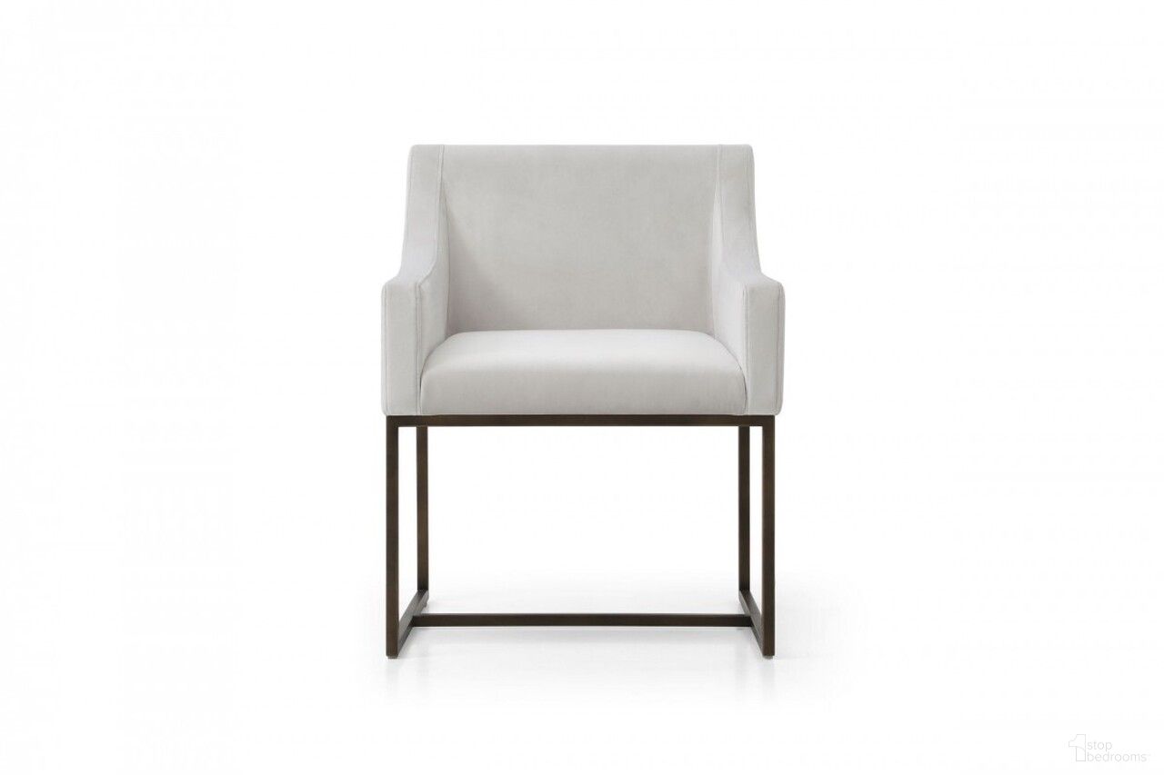 The appearance of Upholstered Fabric Dining Arm Chair In Beige and Antique Brass designed by Homeroots in the transitional interior design. This beige and antique brass piece of furniture  was selected by 1StopBedrooms from  to add a touch of cosiness and style into your home. Sku: 472250. Material: Fabric. Chair Type: Arm Chair.