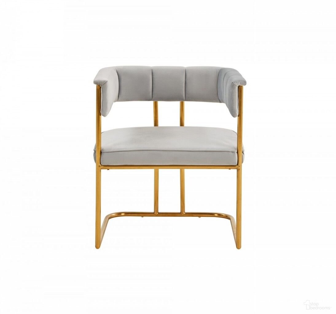 The appearance of Upholstered Fabric Dining Arm Chair In Gray and Gold designed by Homeroots in the modern / contemporary interior design. This gray and gold piece of furniture  was selected by 1StopBedrooms from  to add a touch of cosiness and style into your home. Sku: 472215. Material: Fabric. Chair Type: Arm Chair.