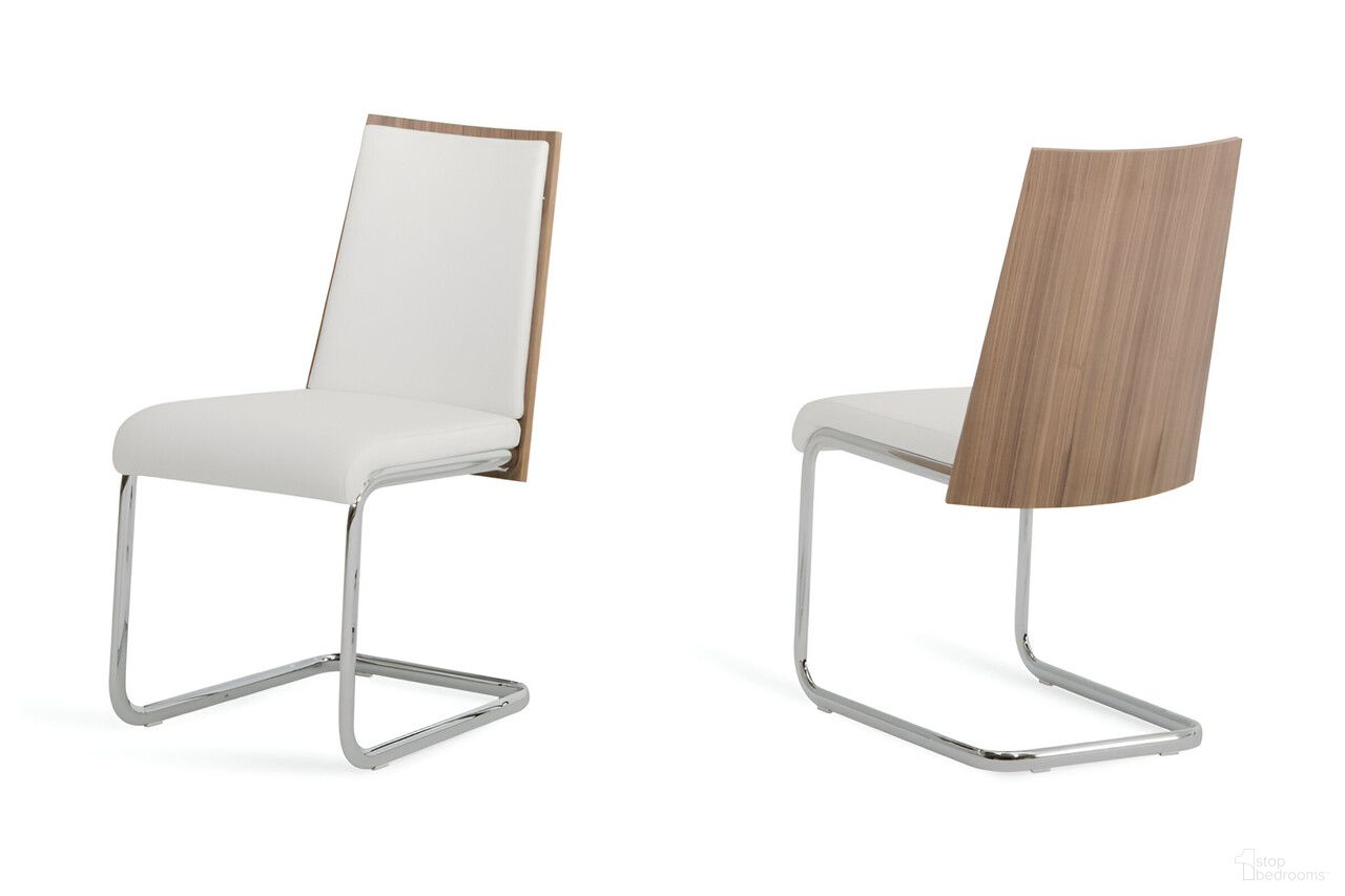 The appearance of Upholstered Faux Leather Dining Side Chairs Set of 2 In White and Silver designed by Homeroots in the modern / contemporary interior design. This white and silver piece of furniture was selected by 1StopBedrooms from to add a touch of cosiness and style into your home. Sku: 384362. Material: Faux Leather. Chair Type: Side Chair.