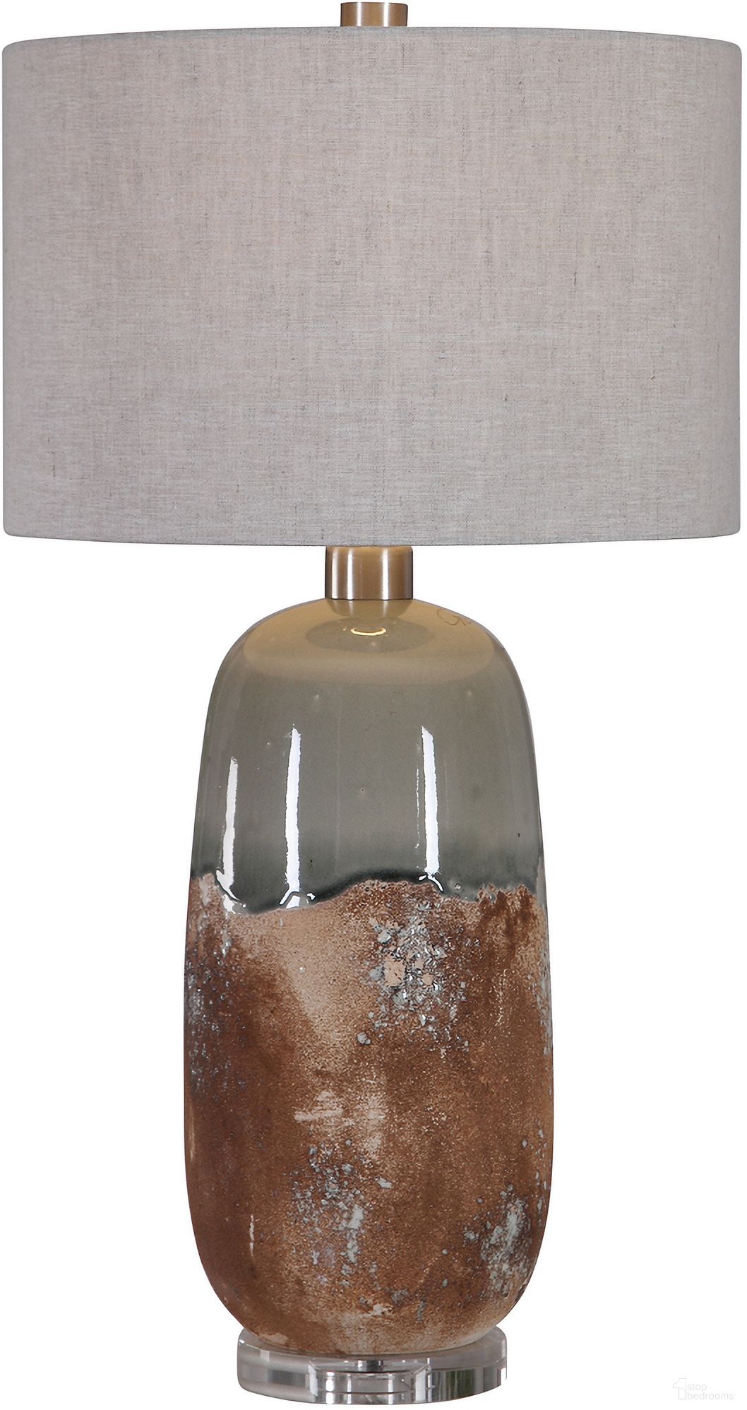 The appearance of Uttermost Maggie Ceramic Table Lamp designed by Uttermost in the modern / contemporary interior design. This brown piece of furniture was selected by 1StopBedrooms from Maggie Collection to add a touch of cosiness and style into your home. Sku: 26381-1. Material: Iron.