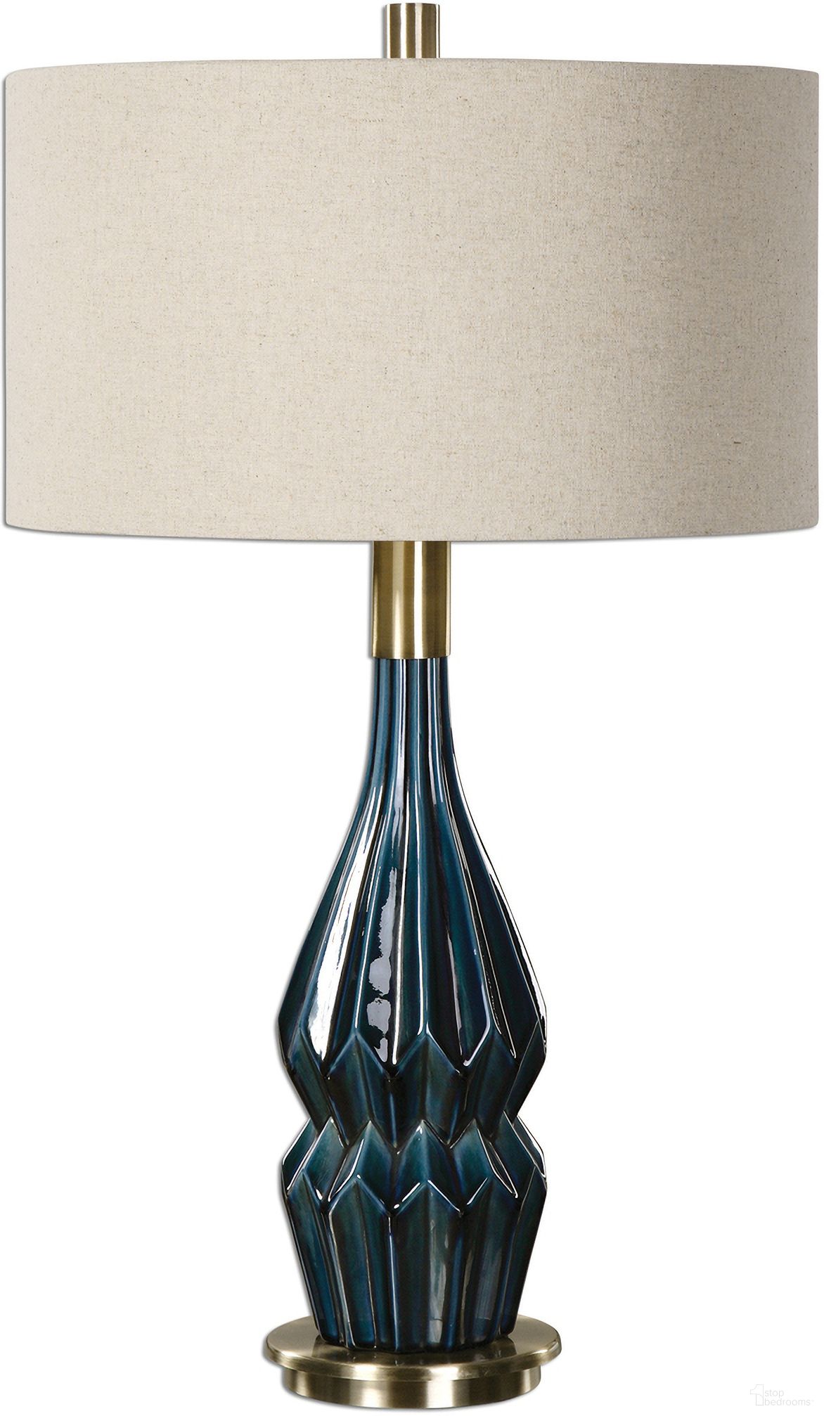 The appearance of Uttermost Prussian Blue Ceramic Lamp designed by Uttermost in the modern / contemporary interior design. This blue piece of furniture was selected by 1StopBedrooms from Prussian Collection to add a touch of cosiness and style into your home. Sku: 27081-1. Material: Metal.