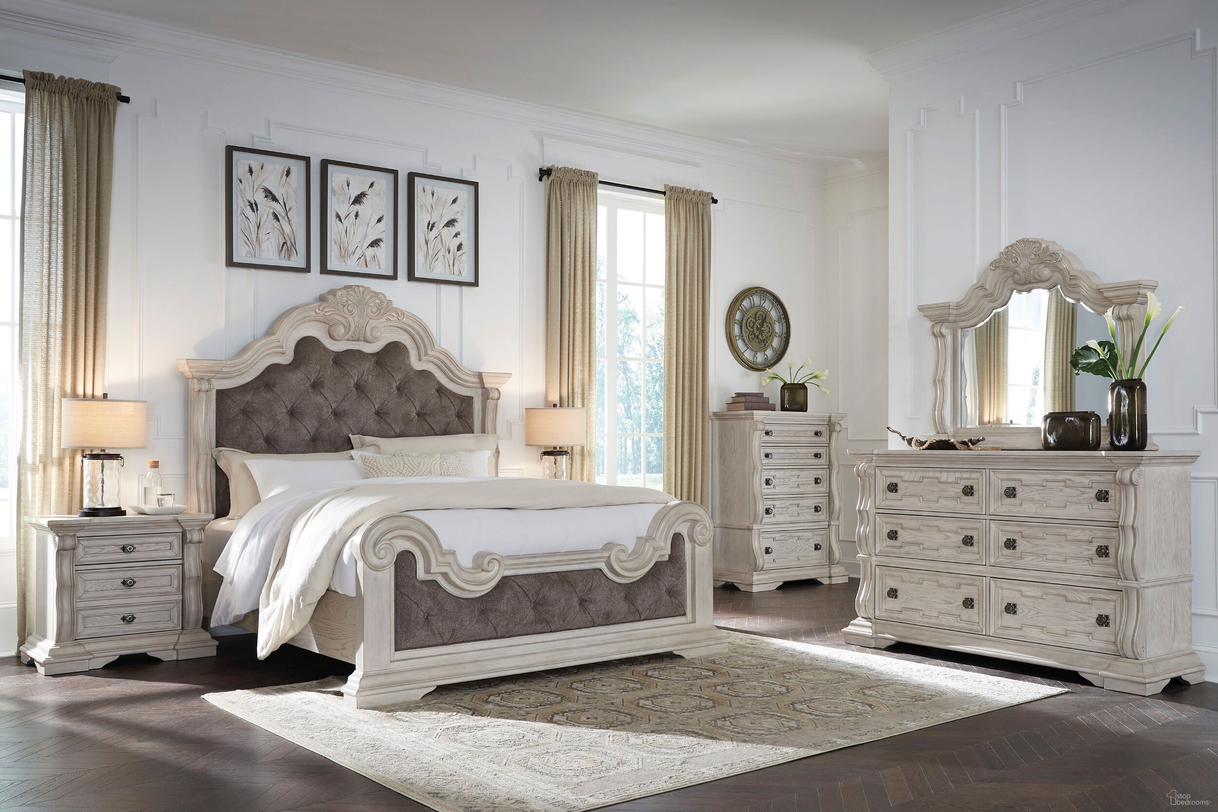 The appearance of Valleymont Upholstered Panel Bedroom Set In Antique White designed by Signature Design by Ashley in the traditional interior design. This antique white piece of furniture  was selected by 1StopBedrooms from Valleymont Collection to add a touch of cosiness and style into your home. Sku: NCB948-54;NCB948-57;NCB948-97;NCB948-93. Material: Wood. Bed Size: California King.