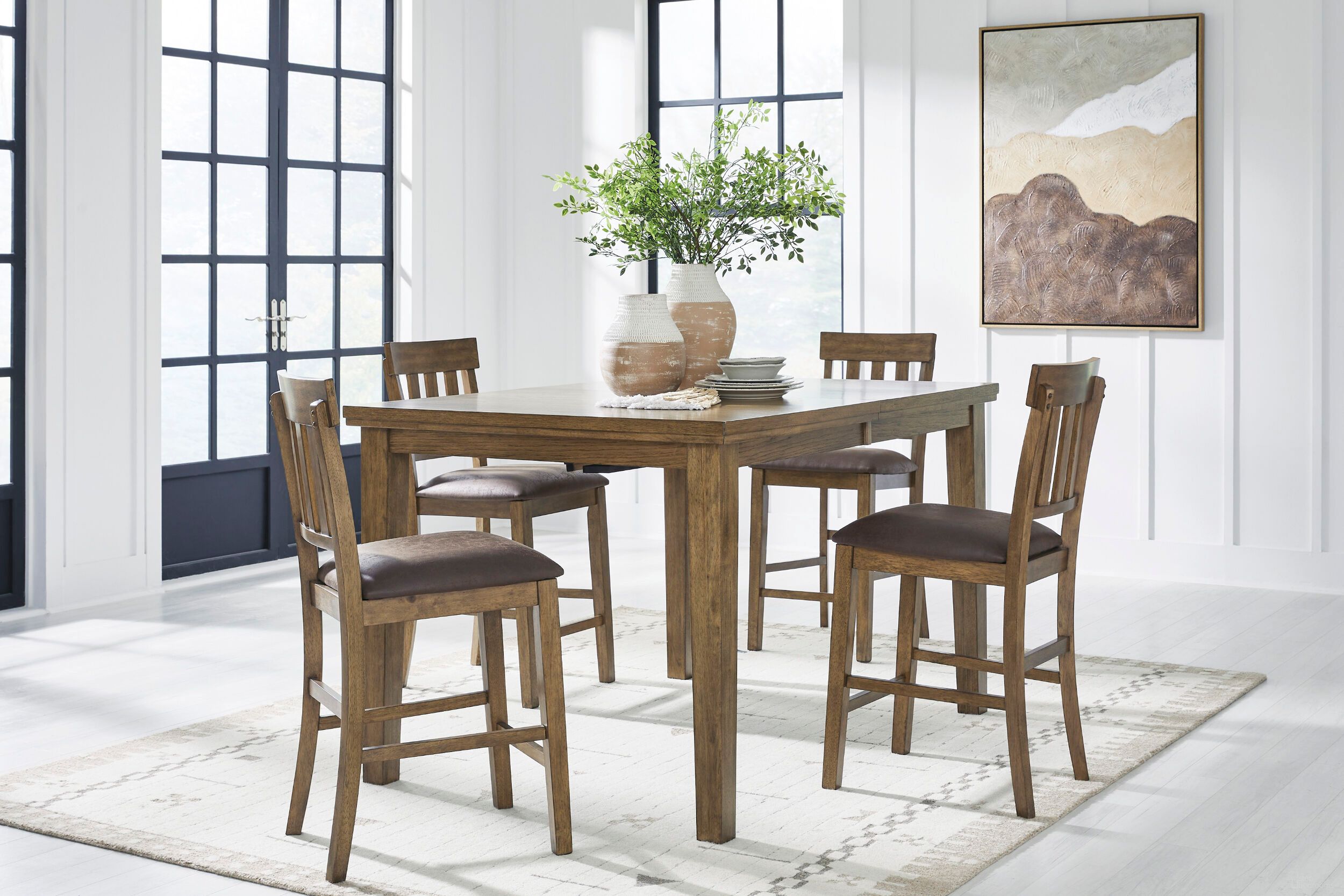 The appearance of Vallister Counter Height Extandable Dining Room Set In Light Brown designed by Signature Design by Ashley in the transitional interior design. This light brown piece of furniture  was selected by 1StopBedrooms from Vallister Collection to add a touch of cosiness and style into your home. Sku: NCD592-32;NCD592-124. Material: Wood. Table Top Shape: Rectangular. Size: 42" x 78".