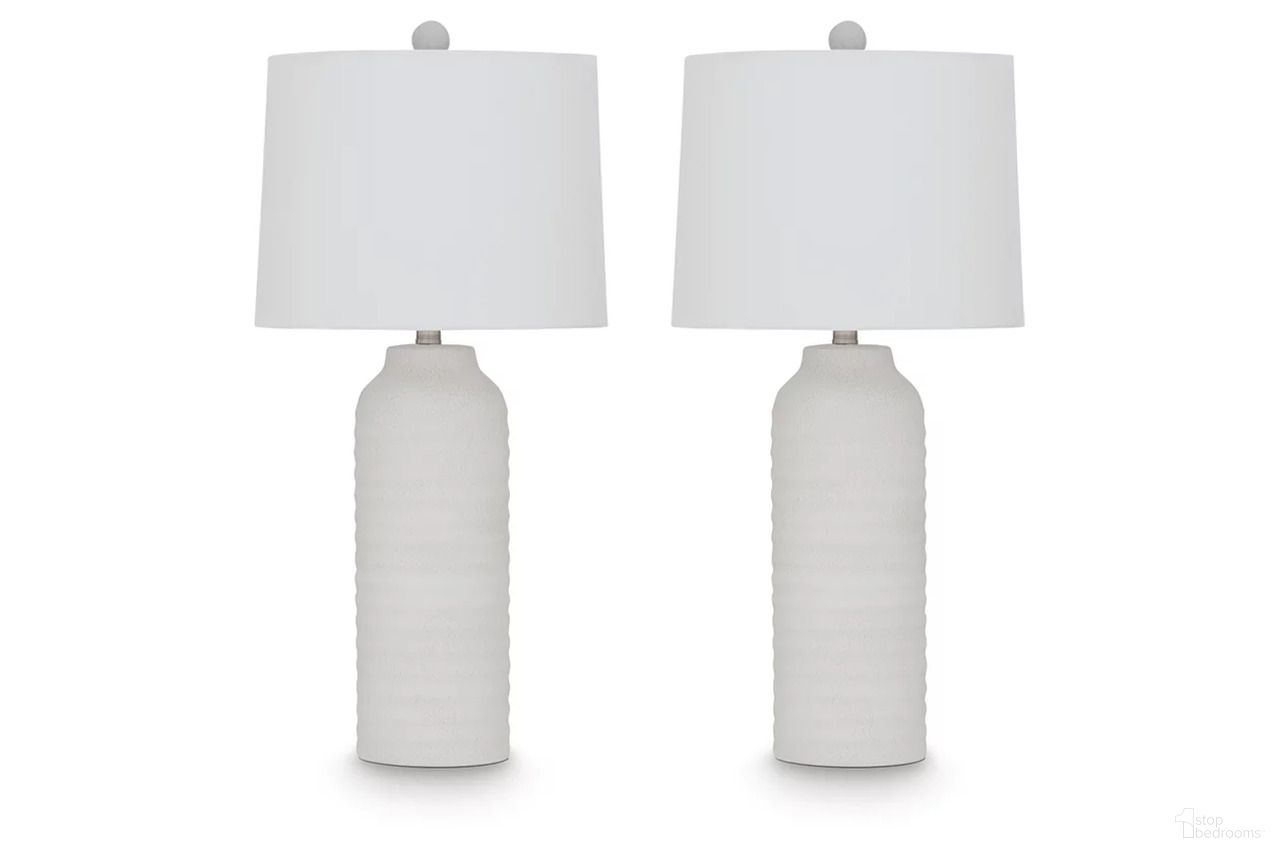The appearance of Vauville polyresin Table Lamp Set of 2 In White designed by Signature Design by Ashley in the transitional interior design. This white piece of furniture was selected by 1StopBedrooms from Vauville Collection to add a touch of cosiness and style into your home. Sku: L243674. Material: Polyresin.