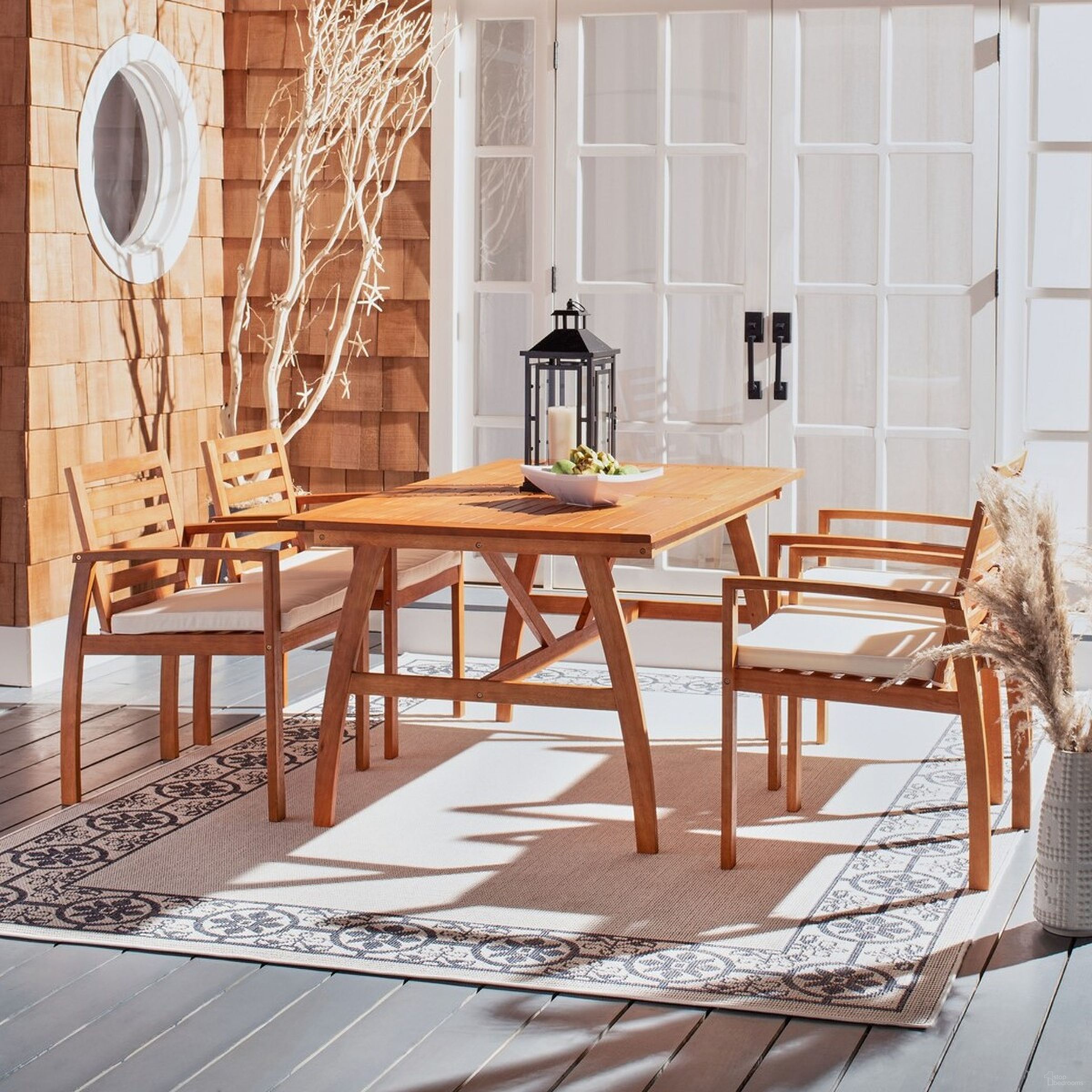 The appearance of Venly Dining Set designed by Safavieh in the modern / contemporary interior design. This beige piece of furniture  was selected by 1StopBedrooms from Safavieh PAT Collection to add a touch of cosiness and style into your home. Sku: PAT7064A-2BX. Table Base Style: Trestle. Material: Steel. Table Top Shape: Rectangular.