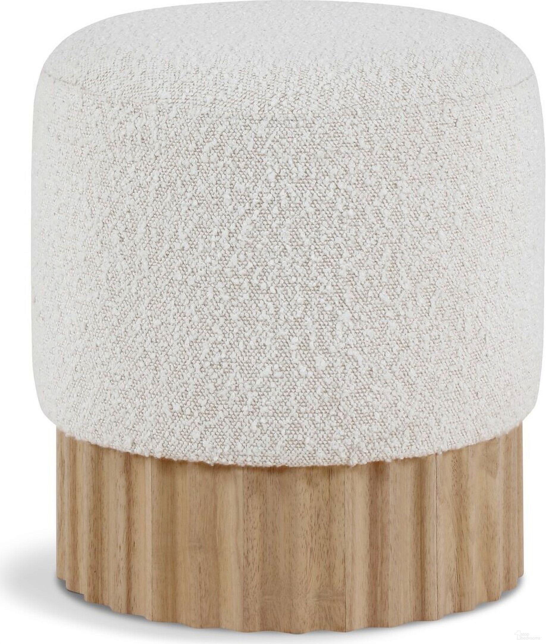 The appearance of Veranda Boucle Fabric Ottoman In Cream/Natural designed by Meridian in the transitional interior design. This cream piece of furniture  was selected by 1StopBedrooms from Veranda Collection to add a touch of cosiness and style into your home. Sku: 22045Cream. Material: Boucle.