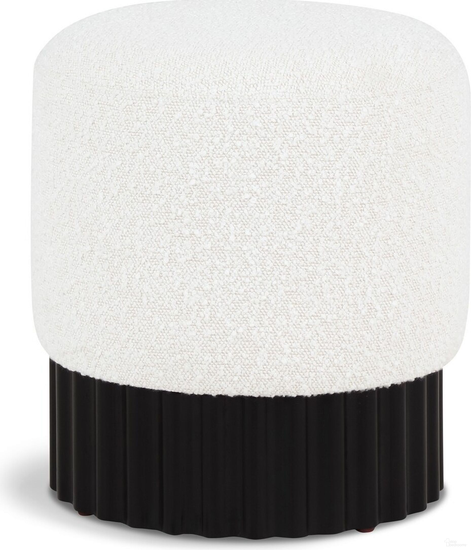 The appearance of Veranda Boucle Fabric Ottoman In Cream/Black designed by Meridian in the transitional interior design. This cream piece of furniture  was selected by 1StopBedrooms from Veranda Collection to add a touch of cosiness and style into your home. Sku: 22046Cream. Material: Boucle.