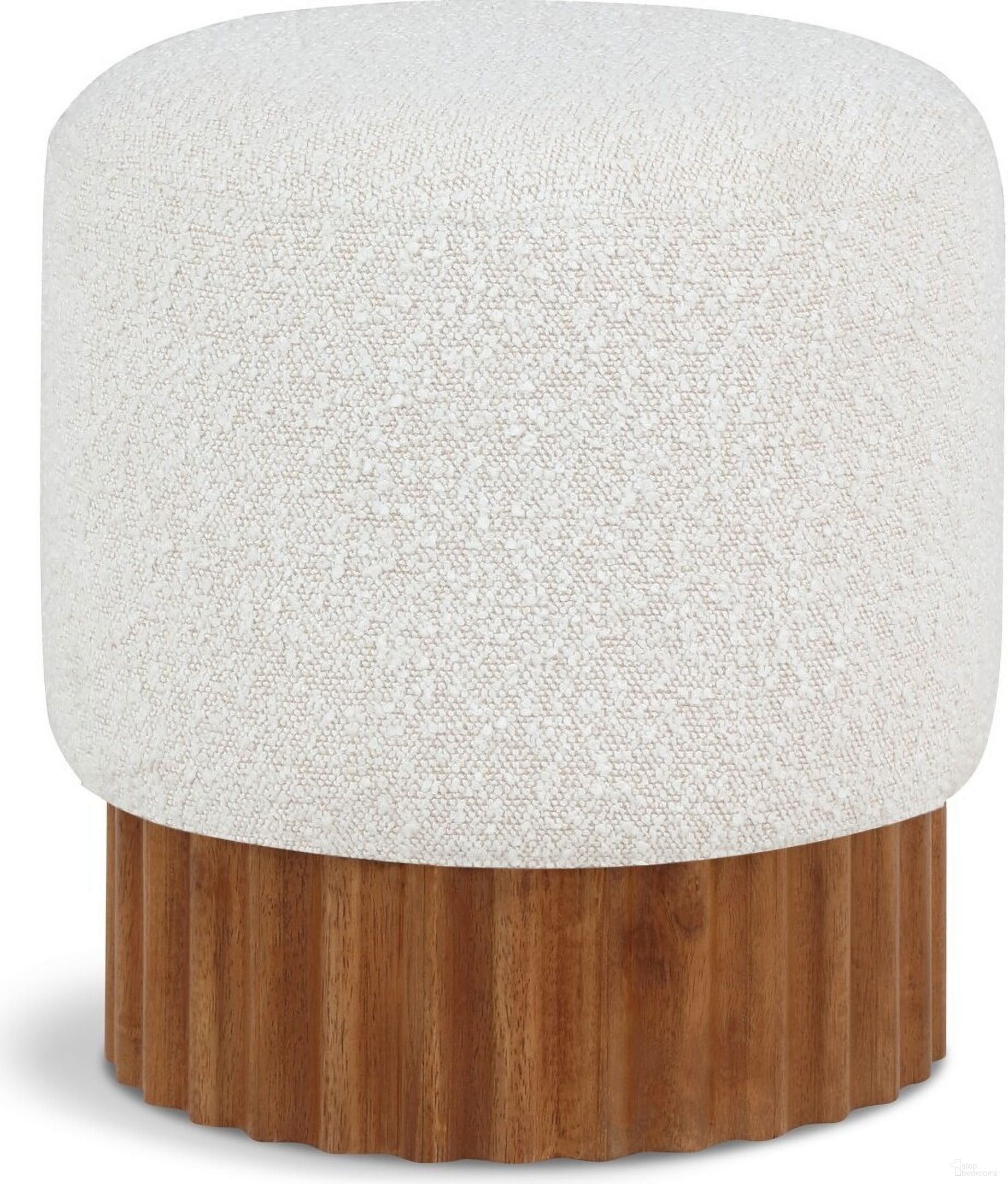 The appearance of Veranda Boucle Fabric Ottoman In Cream/Walnut designed by Meridian in the transitional interior design. This cream piece of furniture  was selected by 1StopBedrooms from Veranda Collection to add a touch of cosiness and style into your home. Sku: 22047Cream. Material: Boucle.