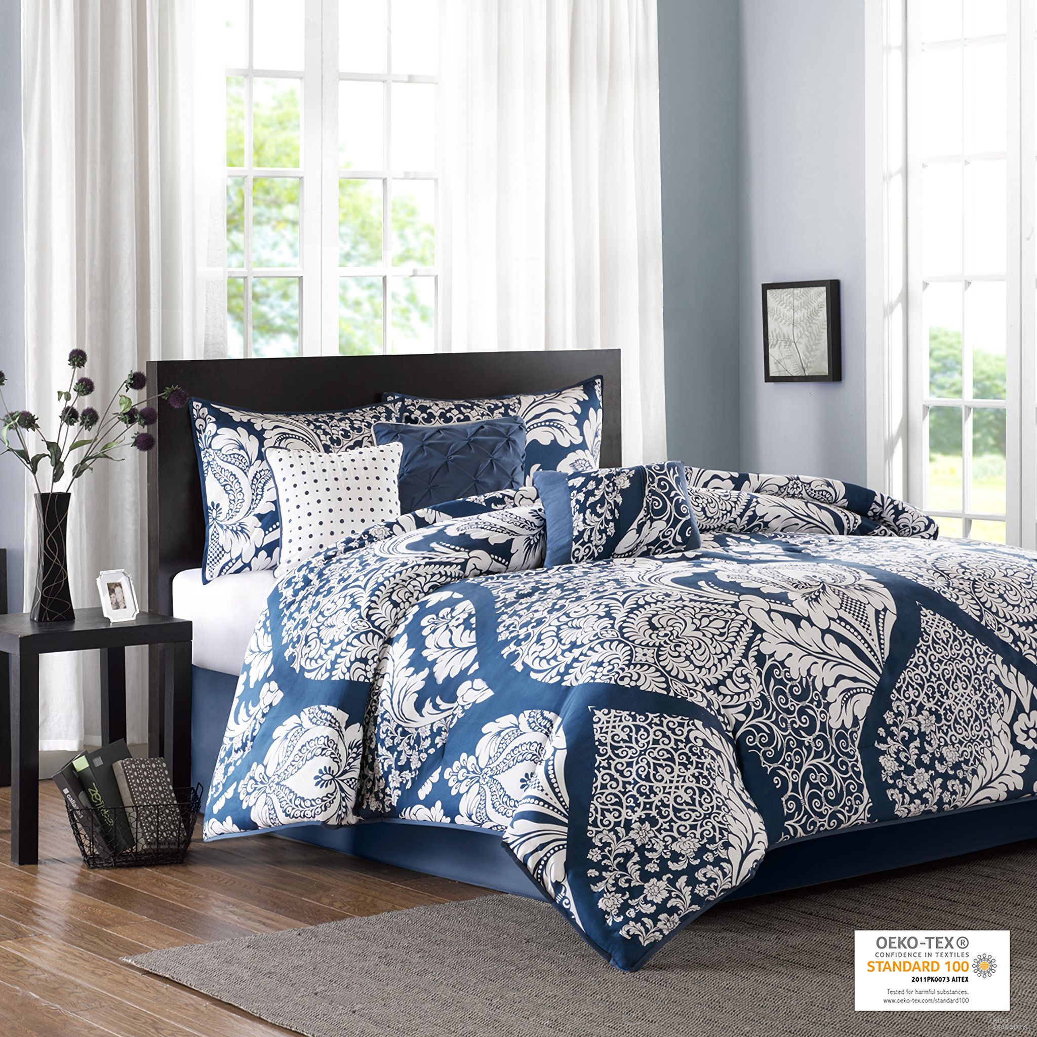 The appearance of Vienna Cotton Printed 7 Piece Queen Comforter Set In Indigo designed by Olliix in the transitional interior design. This indigo piece of furniture  was selected by 1StopBedrooms from Vienna Collection to add a touch of cosiness and style into your home. Sku: MP10-3829. Material: Polyester. Bed Size: Queen.