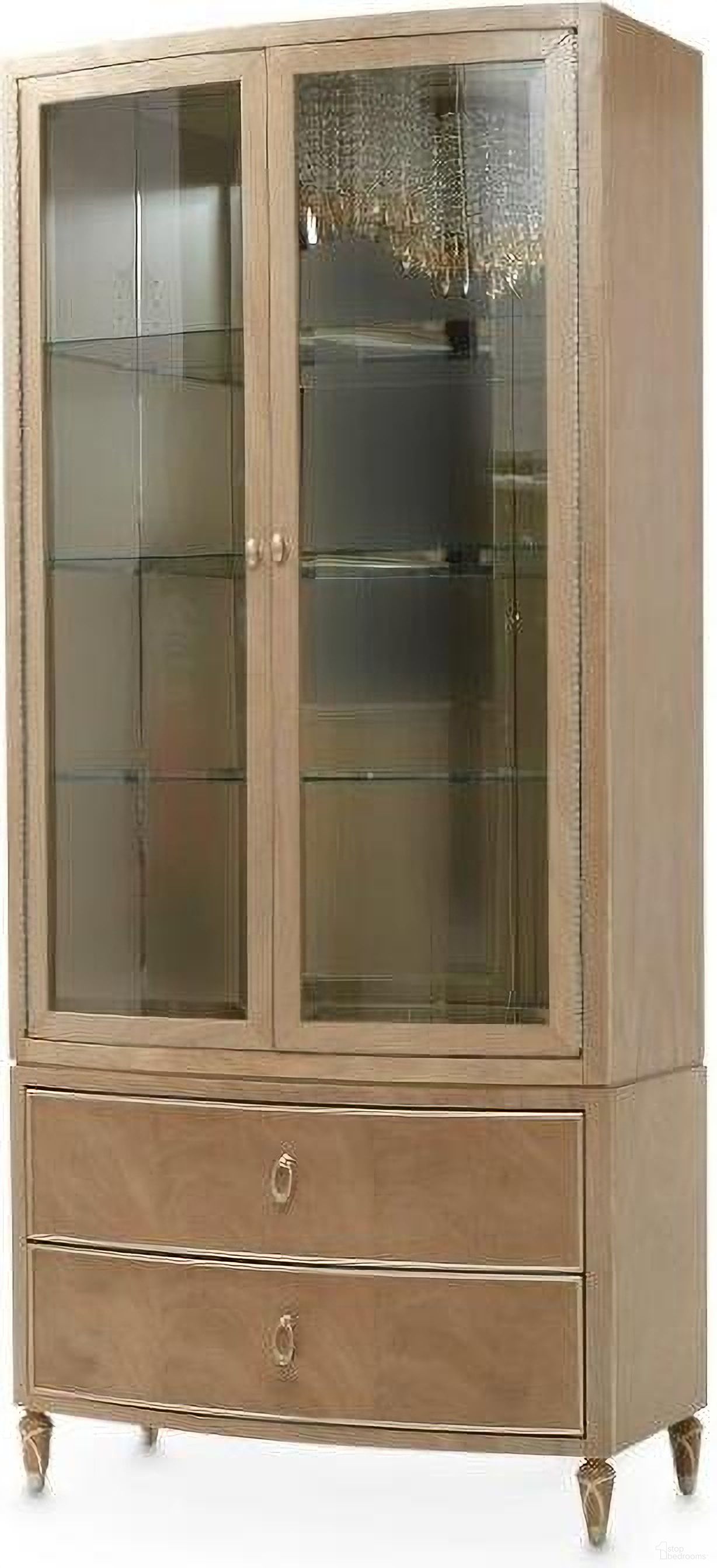 The appearance of Villa Cherie Display Cabinet In Caramel designed by Michael Amini in the transitional interior design. This caramel piece of furniture was selected by 1StopBedrooms from Villa Collection to add a touch of cosiness and style into your home. Sku: N9008209-134. Material: Glass.