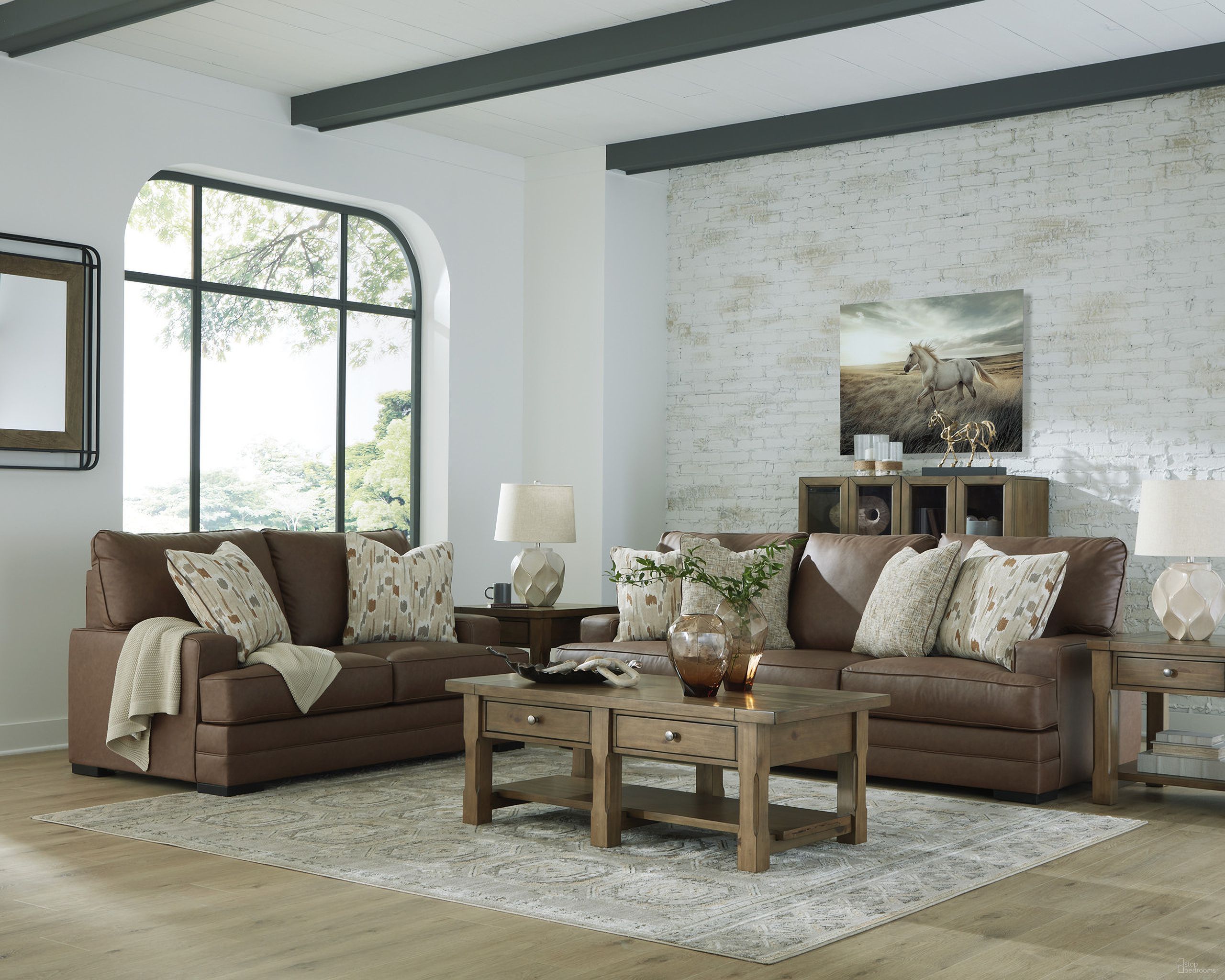 The appearance of VillaCourt Living Room Set In Caramel designed by Signature Design by Ashley in the modern / contemporary interior design. This caramel piece of furniture was selected by 1StopBedrooms from VillaCourt Collection to add a touch of cosiness and style into your home. Sku: 7490938;7490935. Material: Faux Leather.