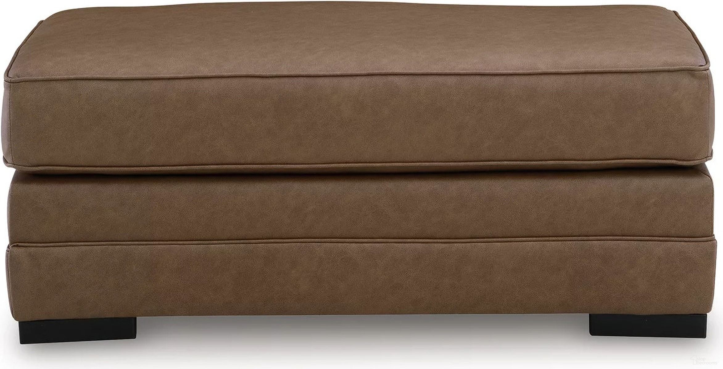 The appearance of VillaCourt Ottoman In Caramel designed by Signature Design by Ashley in the modern / contemporary interior design. This caramel piece of furniture was selected by 1StopBedrooms from VillaCourt Collection to add a touch of cosiness and style into your home. Sku: 7490914. Material: Faux Leather.