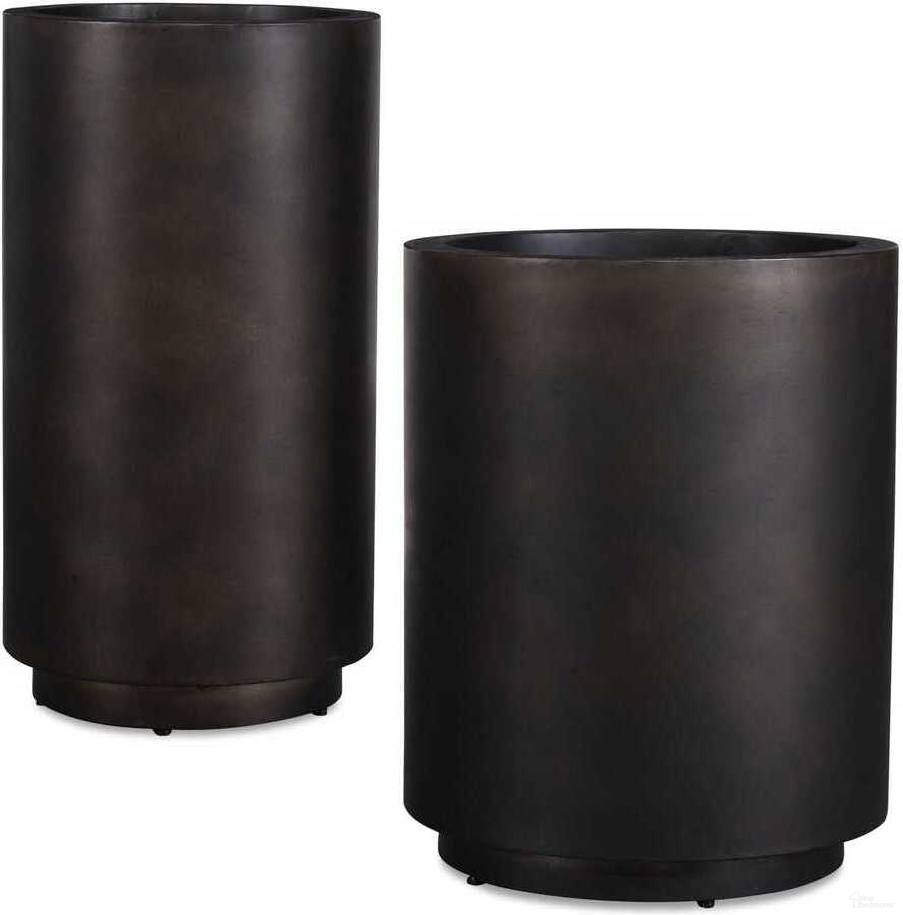 The appearance of Volcan Outdoor Planters Set of 2 In Bronze designed by Uttermost in the industrial interior design. This bronze piece of furniture was selected by 1StopBedrooms from Volcan Collection to add a touch of cosiness and style into your home. Sku: 18276. Material: Iron.