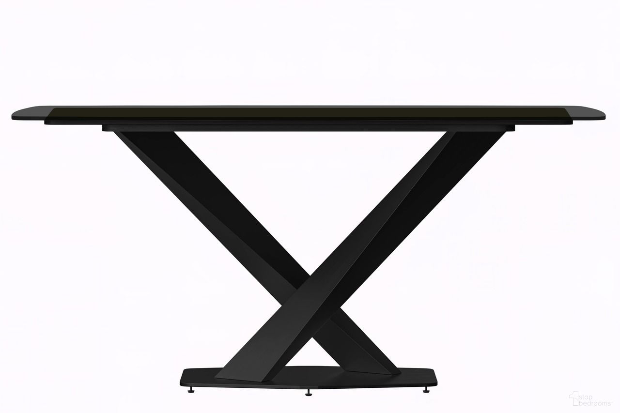 The appearance of Voren 55 Inch Dining Table with Glass Top In Black designed by LeisureMod in the modern / contemporary interior design. This black piece of furniture  was selected by 1StopBedrooms from Voren Collection to add a touch of cosiness and style into your home. Sku: VTBL-55BL-G. Table Base Style: Pedestal. Material: Glass. Table Top Shape: Rectangular. Size: 32" x 55".