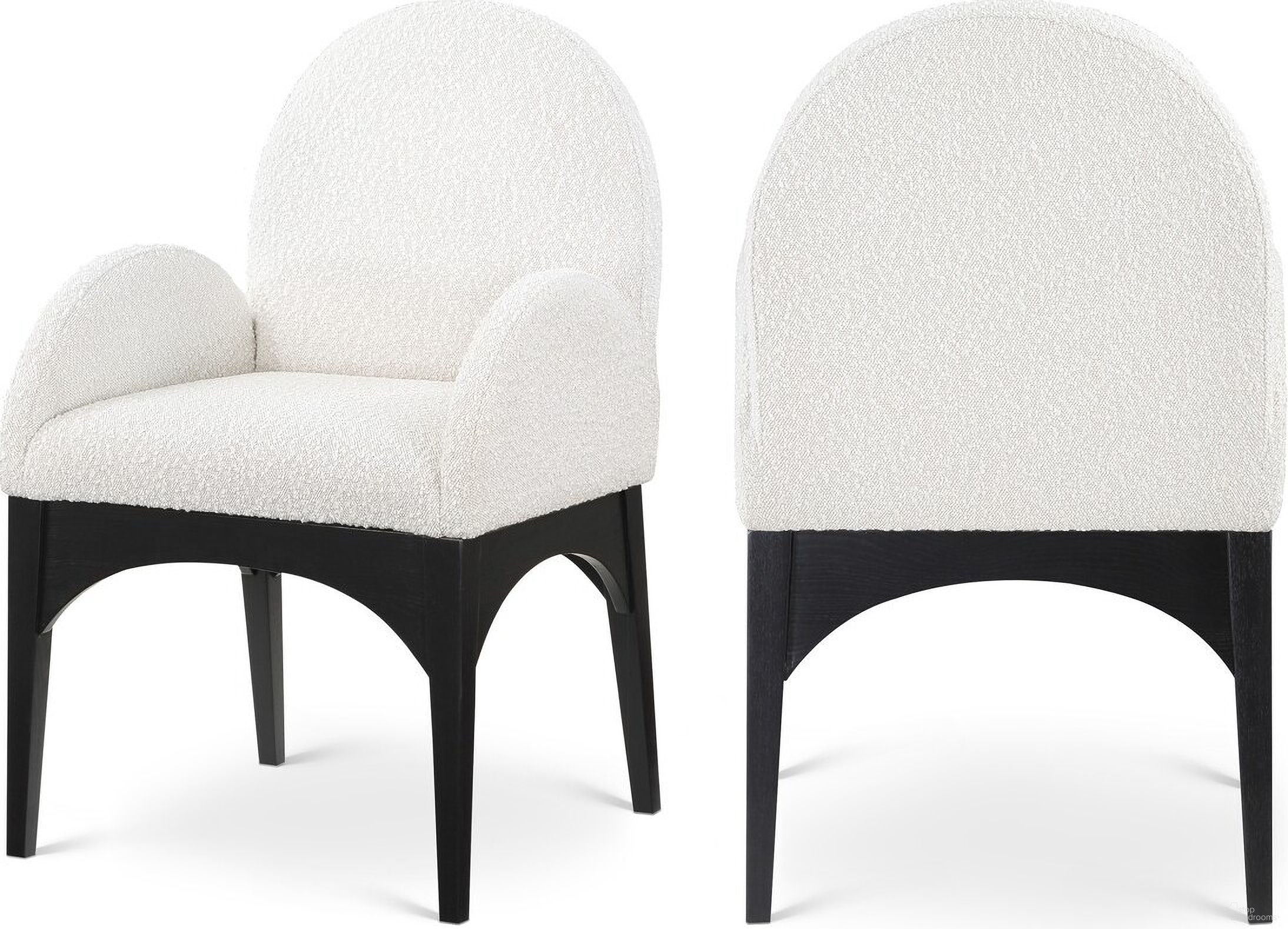 The appearance of Waldorf Boucle Fabric Dining Arm Chair In Cream/Black designed by Meridian in the modern / contemporary interior design. This cream piece of furniture was selected by 1StopBedrooms from Waldorf Collection to add a touch of cosiness and style into your home. Sku: 381Cream-AC. Material: Wood. Chair Type: Arm Chair.