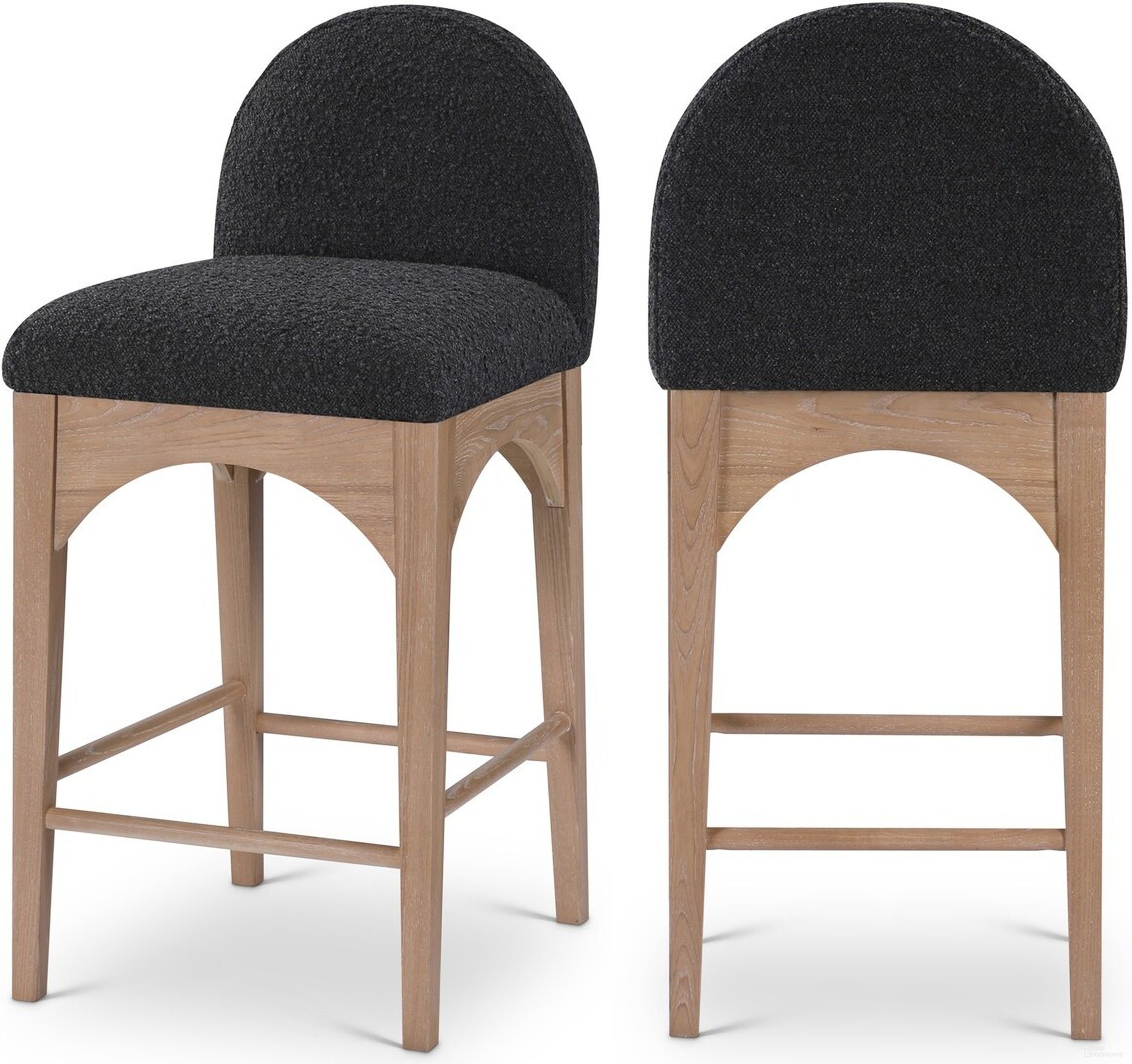 The appearance of Waldorf Boucle Fabric Stool In Black/Natural designed by Meridian in the modern / contemporary interior design. This black piece of furniture was selected by 1StopBedrooms from Waldorf Collection to add a touch of cosiness and style into your home. Sku: 394Black-C. Material: Wood.