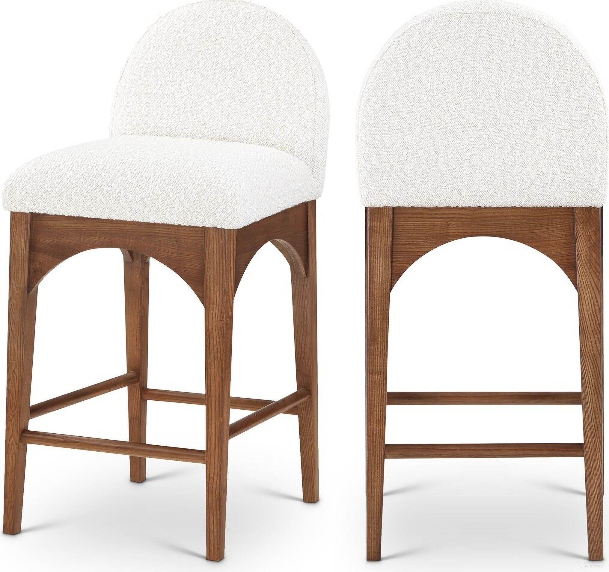 The appearance of Waldorf Boucle Fabric Stool In White/Walnut designed by Meridian in the modern / contemporary interior design. This cream piece of furniture was selected by 1StopBedrooms from Waldorf Collection to add a touch of cosiness and style into your home. Sku: 399Cream-C. Material: Wood.