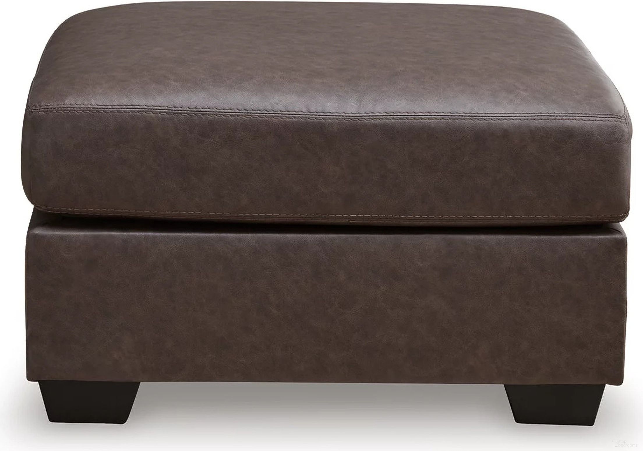 The appearance of Walker Point Oversized Accent Ottoman In Umber designed by Signature Design by Ashley in the modern / contemporary interior design. This umber piece of furniture was selected by 1StopBedrooms from Walker Point Collection to add a touch of cosiness and style into your home. Sku: NC2770508. Material: Faux Leather.