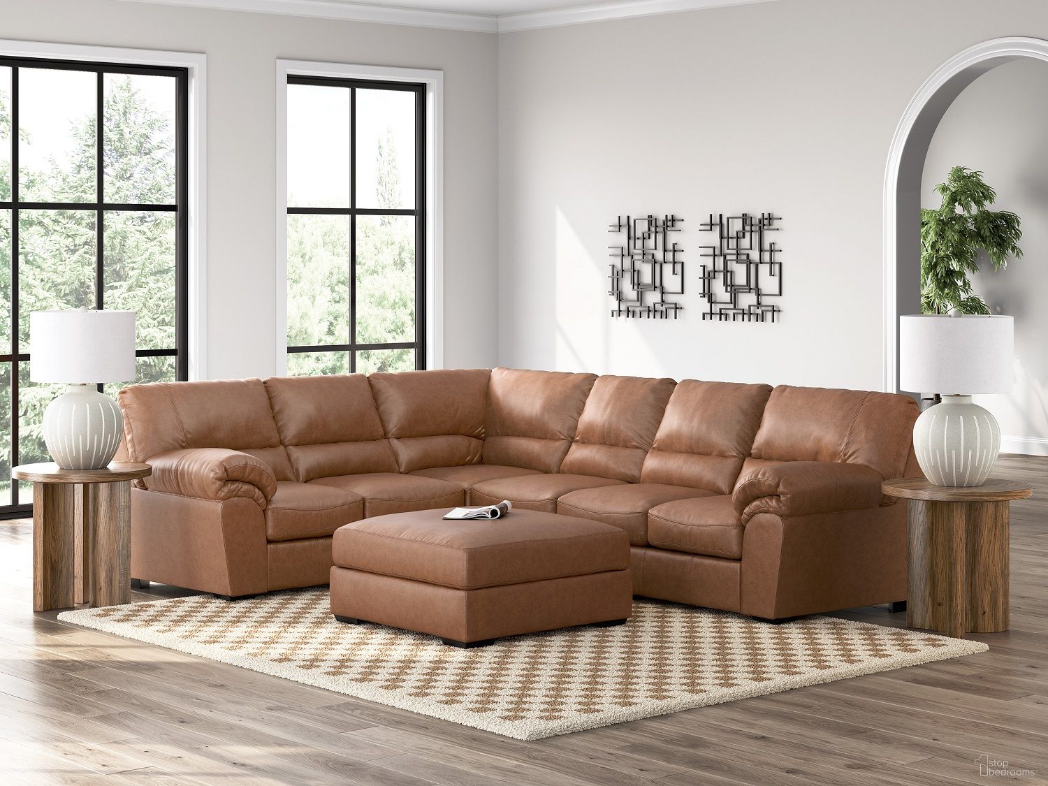 The appearance of Walker Point RAF 3-Piece Sectional In Caramel designed by Signature Design by Ashley in the modern / contemporary interior design. This caramel piece of furniture  was selected by 1StopBedrooms from Walker Point Collection to add a touch of cosiness and style into your home. Sku: NC2770466;NC2770446;NC2770456. Material: Leather. Layout: L-Shape.
