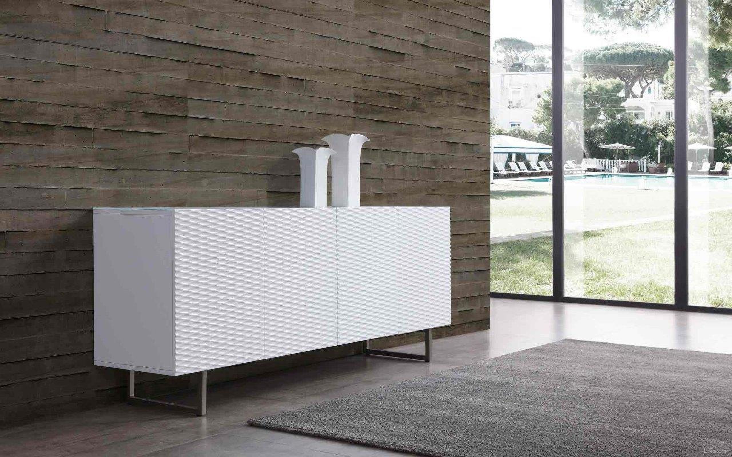 The appearance of Wally White Buffet designed by Whiteline Modern Living in the modern / contemporary interior design. This white piece of furniture was selected by 1StopBedrooms from Wally Collection to add a touch of cosiness and style into your home. Sku: SB1179-WHT. Material: Glass.