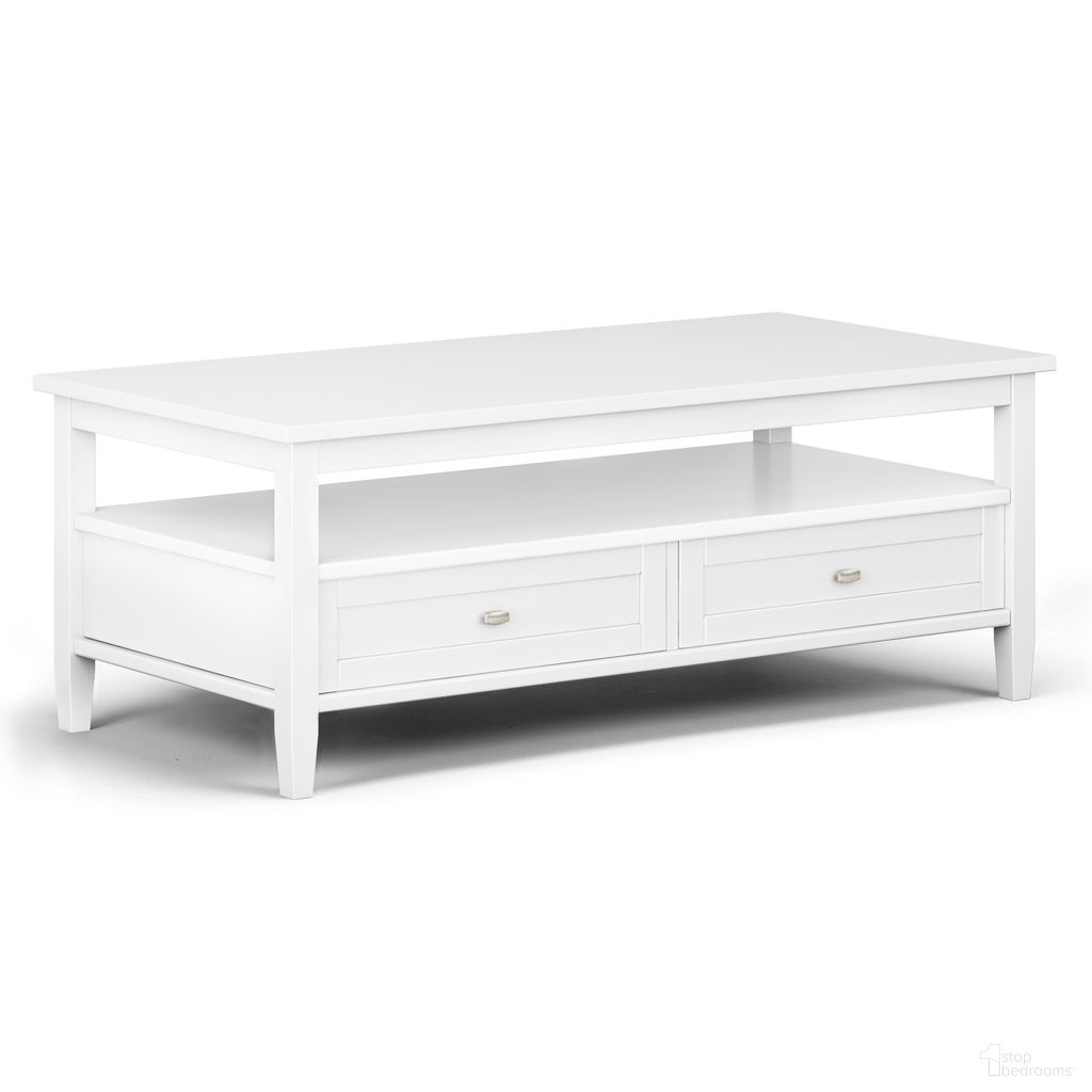 The appearance of Warm Shaker Solid Wood Coffee Table In White designed by Simpli Home in the transitional interior design. This white piece of furniture  was selected by 1StopBedrooms from Warm Shaker Collection to add a touch of cosiness and style into your home. Sku: AXCWSH01-WH. Material: Pine.